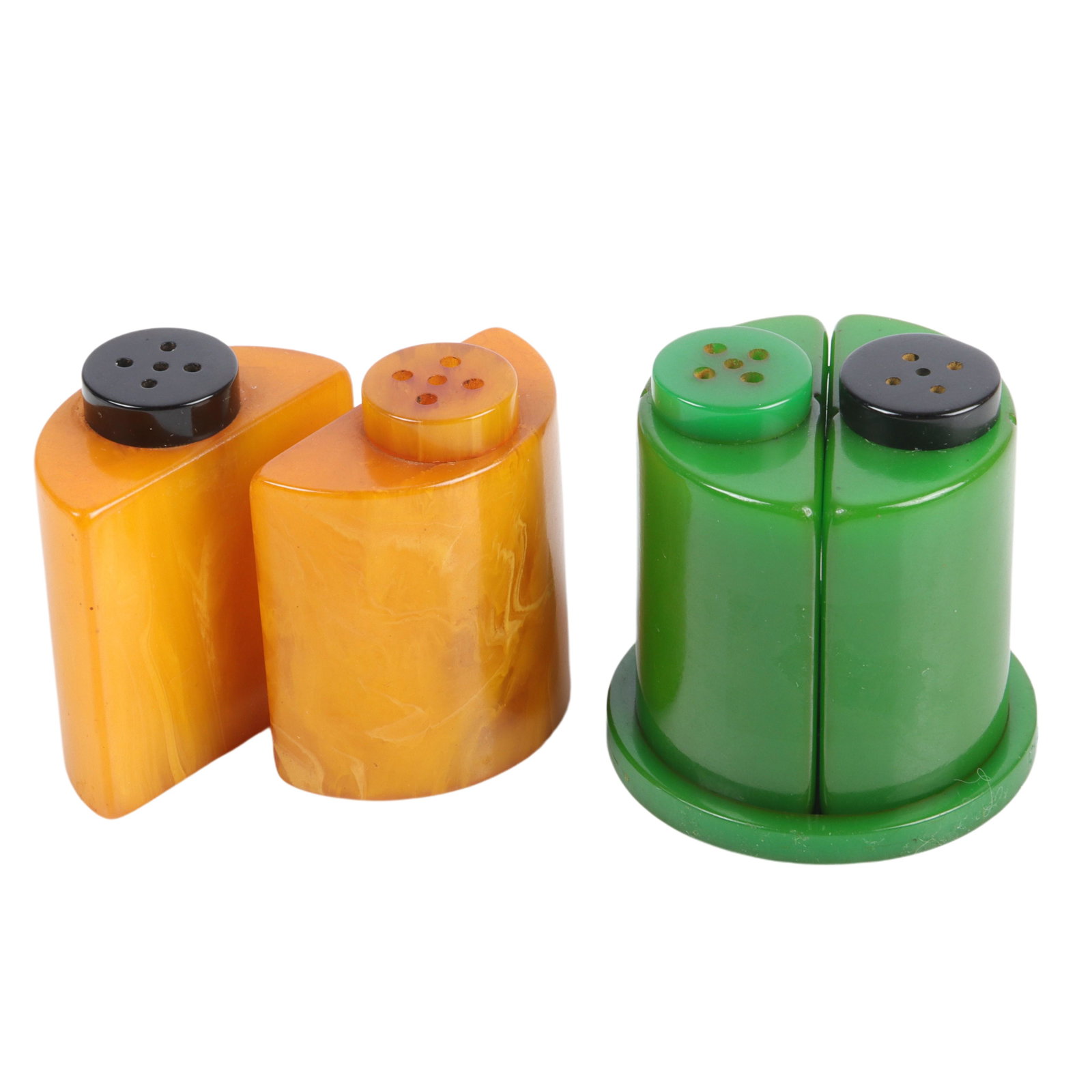 Two Bakelite salt and peppers: yellow Demilune set and: Two Bakelite salt and peppers: yellow Demilune set and green set with base. 1 1/2"Dia x 2"H (both)