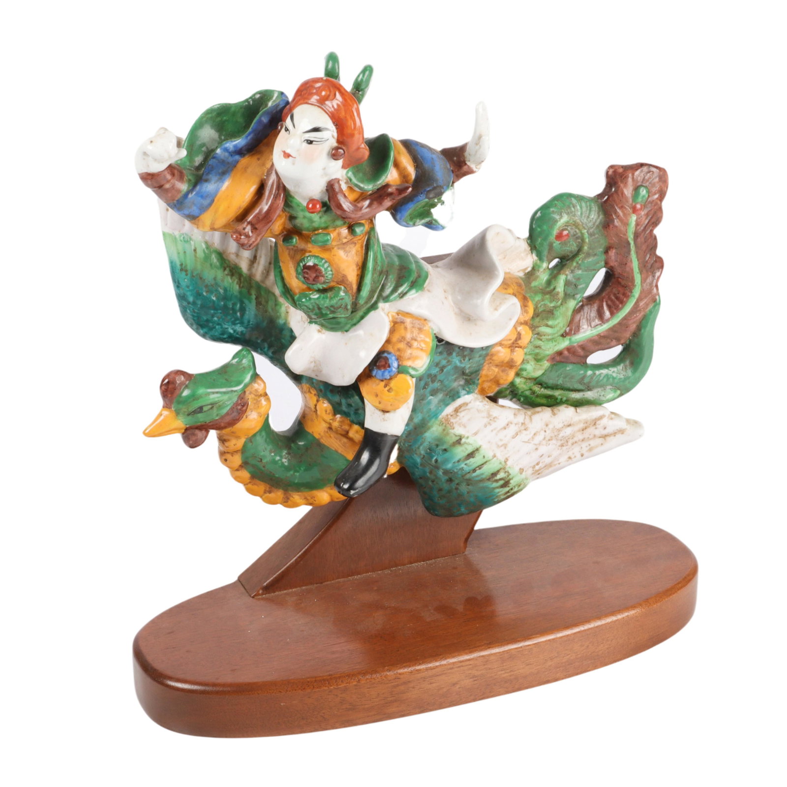 Chinese ceramic glazed earthenware roof tile figure on: Chinese ceramic glazed earthenware roof tile figure on bird in flight. 14 1/2"H x 13"W x 5 1/4"D