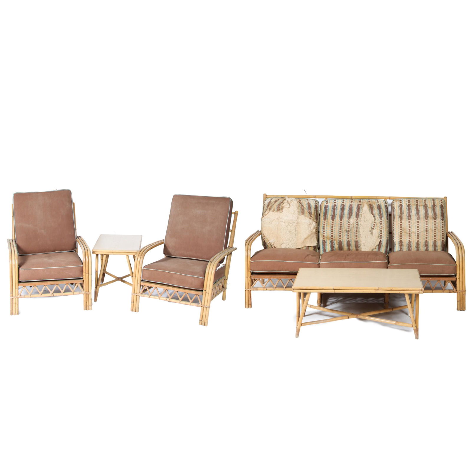 Ficks Reed Co. MCM Tiki 5pc rattan: sofa, two chairs,: Ficks Reed Co. MCM Tiki 5pc rattan: sofa, two chairs, coffee and side table. loss to cushions as shown. 33"H x 72"W x 30"D (sofa)