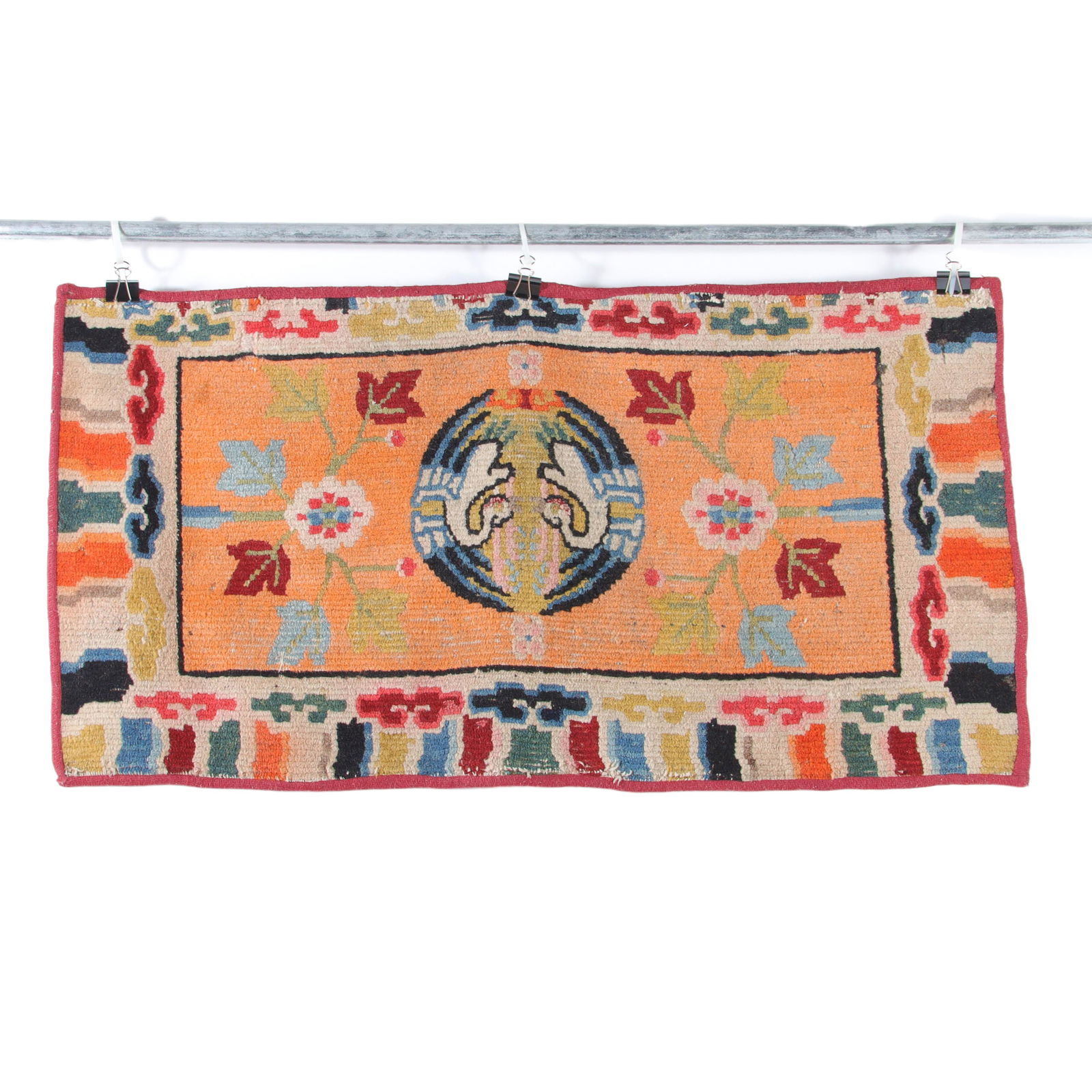 Antique Tibetan small wool carpet / rug with Buddhist symbols: lightening bolts, clouds, swans, (1 of 6)