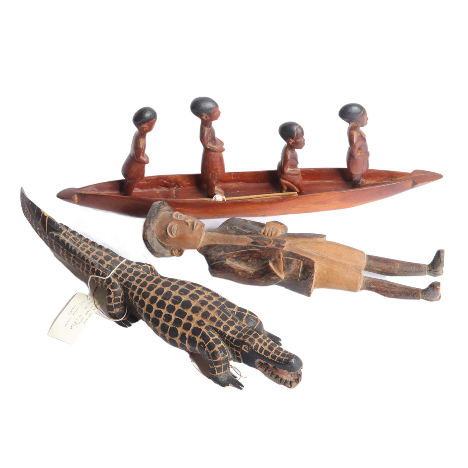 African 7pc carved painted folk art figures: canoe with four standing figures 1 3/4"H x 20 1/2"W x 2 (1 of 7)