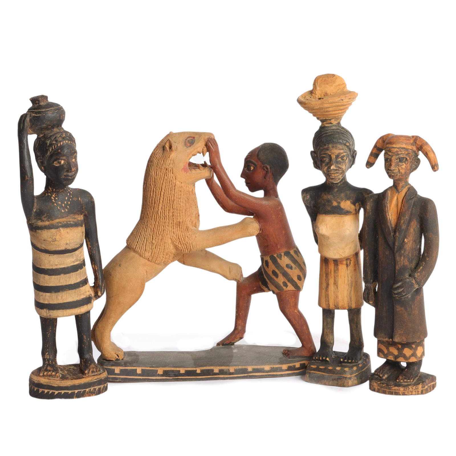 Four African hand-carved and painted folk art figures, including man fighting lion. 9 1/2"H x 8"W x (1 of 6)
