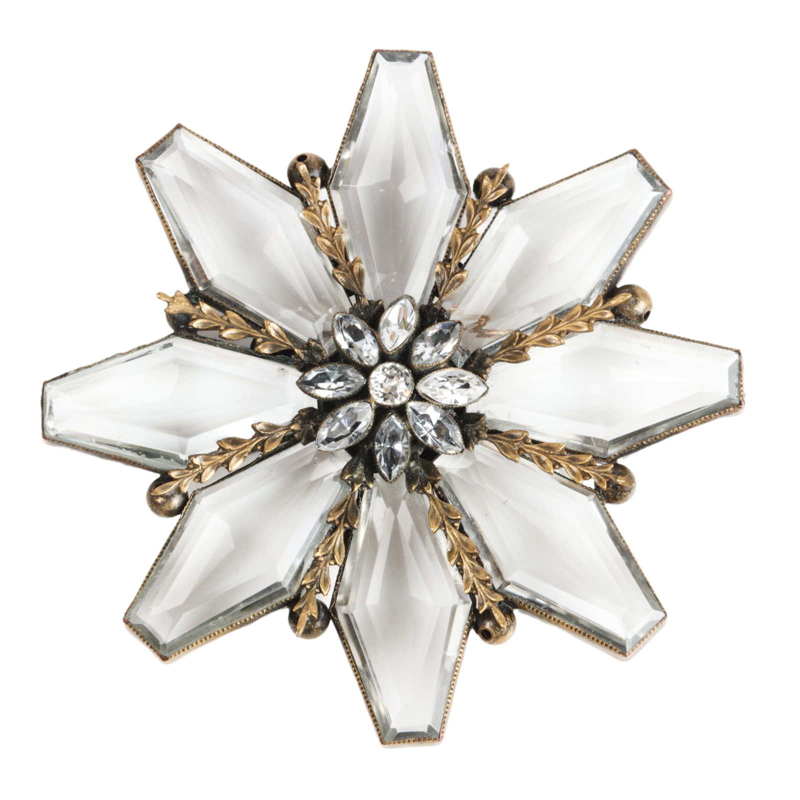 Early large Joseff of Hollywood old stamp crystal star flower pin brooch:, 44"Diam.: Early large Joseff of Hollywood old stamp crystal star flower pin brooch: with large colorless faceted jewels, marquise crystals, and brass leaves. Similar to brooch pictured on page 150 in Joanne Dub