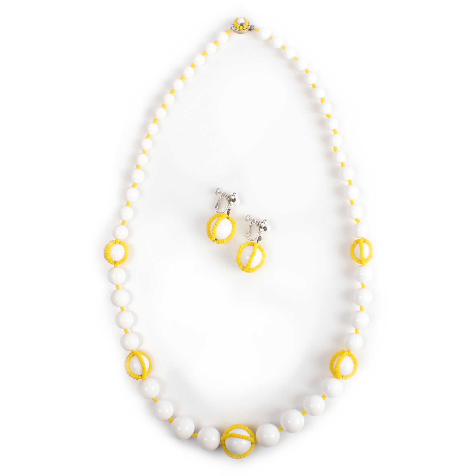 Miriam Haskell white graduated beads with yellow seed beads necklace and earring set. 30 1/2"L: Miriam Haskell white graduated beads with yellow seed beads necklace and earring set. 30 1/2"L (necklace), 1 3/4"H x 1"W (earrings)