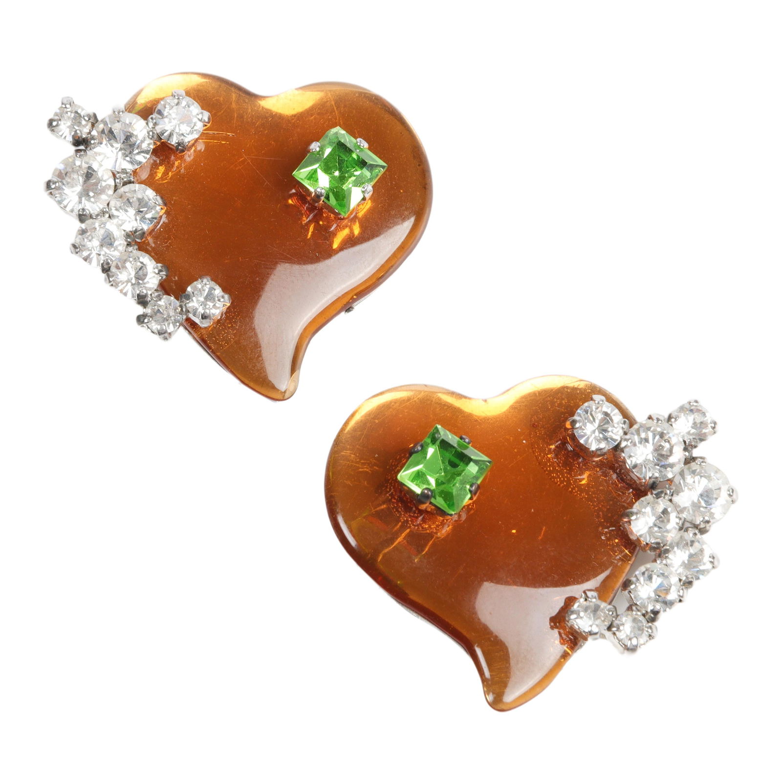 Christian Lacroix translucent orange heart earrings studded with green rhinestone & crystals. 1: Christian Lacroix translucent orange heart earrings studded with green rhinestone & crystals. 1 1/2"Diam.