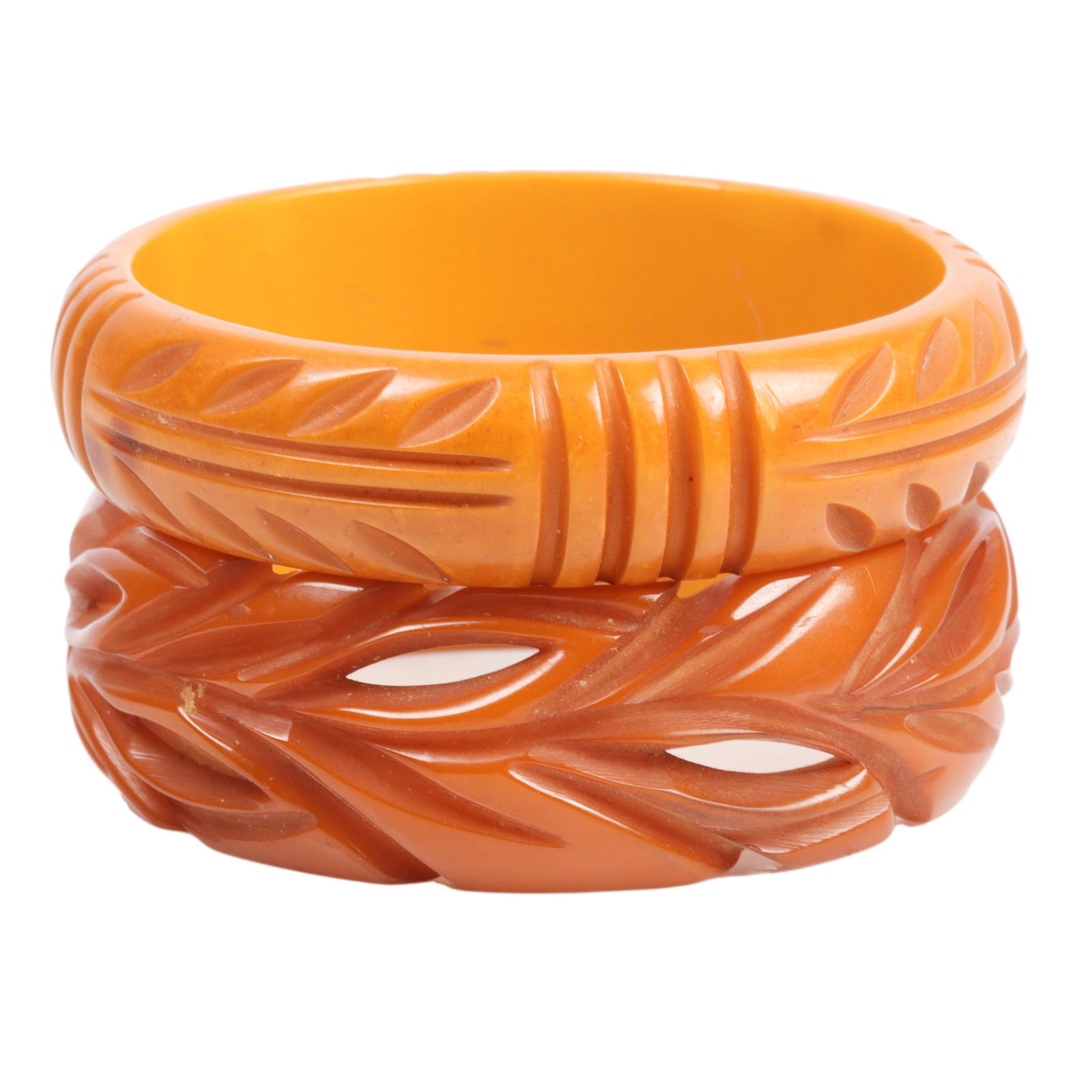 Two carved bakelite bangle bracelets with vining leaf designs, one pierced. 2 1/2"inner Diam. (1 of 3)