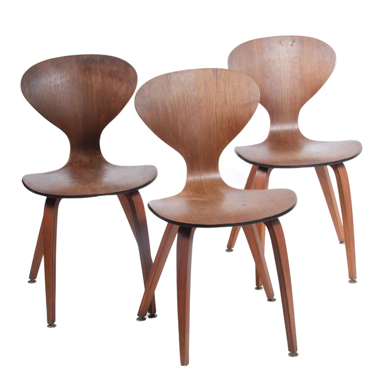 Three Norman Cherner Plycraft walnut MCM bentwood ant chairs. 32"H x 17 3/4"W x 23"D, 18 1/2"H: Three Norman Cherner Plycraft walnut MCM bentwood ant chairs. The chairs are not marked. One chair has been repaired in that the seat looks to have separated from the bottom. The chair has been reatta