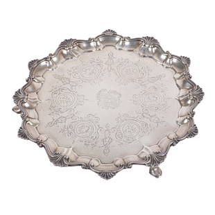 John Samuel Hunt English Victorian sterling silver salver tray with armorial coat of arms crest on: John Samuel Hunt English Victorian sterling silver salver tray with armorial coat of arms crest on three pad feet. Hunt & Roskell, Storr and Mortimer mark. London, 19th Century, 1856. 18.006 ozt. 1"H