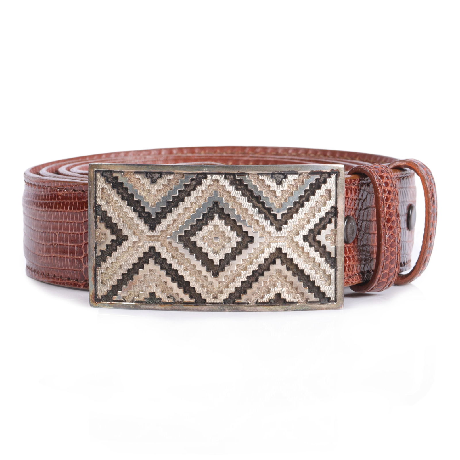 Dan Jackson Navajo Native American sterling silver hand sawed chiseled overlay belt buckle size 42: Dan Jackson Navajo Native American sterling silver hand sawed chiseled overlay belt buckle in Navajo rug pattern. Tom Taylor cognac genuine lizard handmade belt. size 42 (belt), 1 5/8"H x 3"W (buckle)