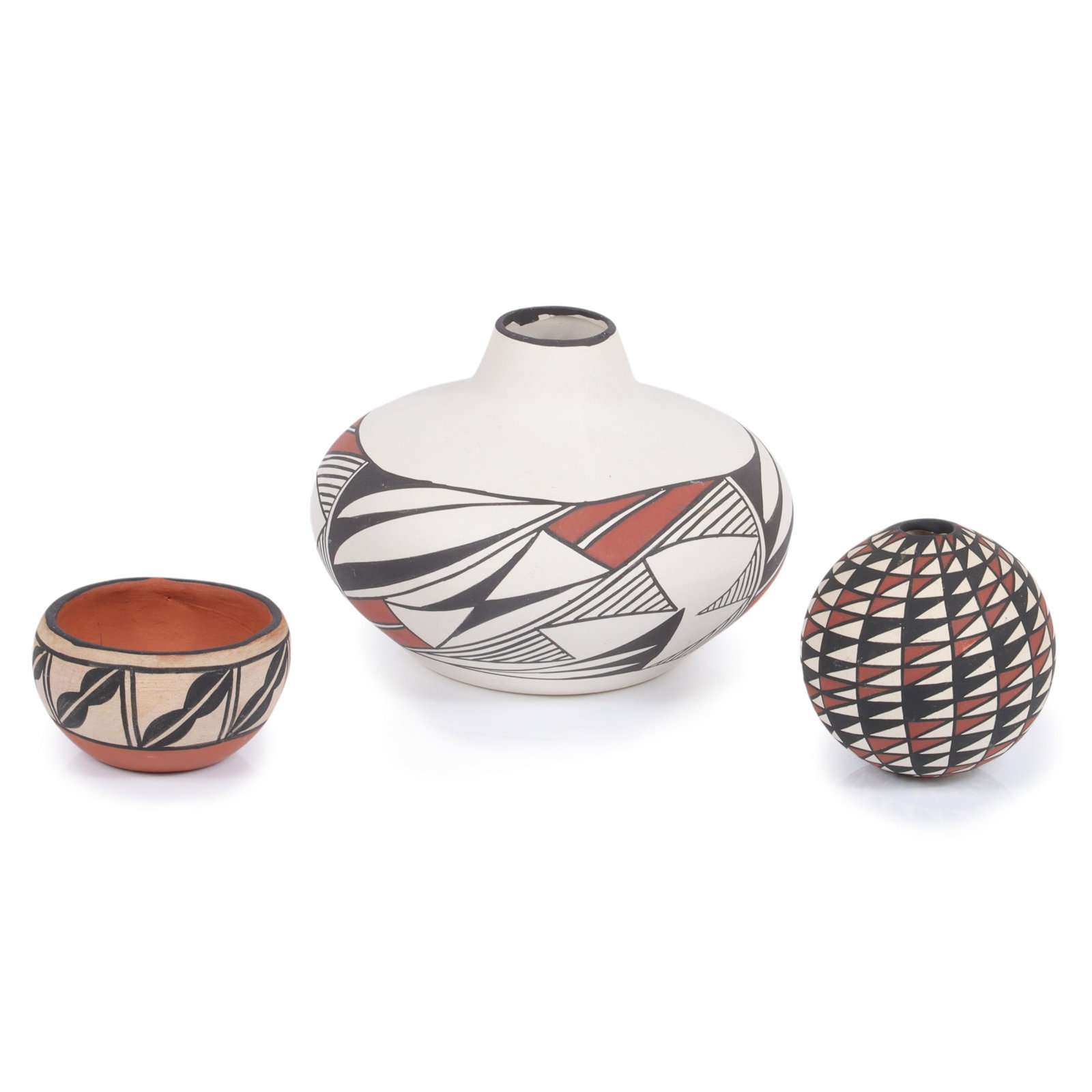 Three Acoma Native American Indian hand painted pottery vessels: 4 1/2"H x 7"diam (tallest Mailie): Three Acoma Native American Indian hand painted pottery vessels: including HildaTenoria Santo Domingo bowl and Rita Mailie round jar / vase. 4 1/2"H x 7"diam (tallest Mailie)
