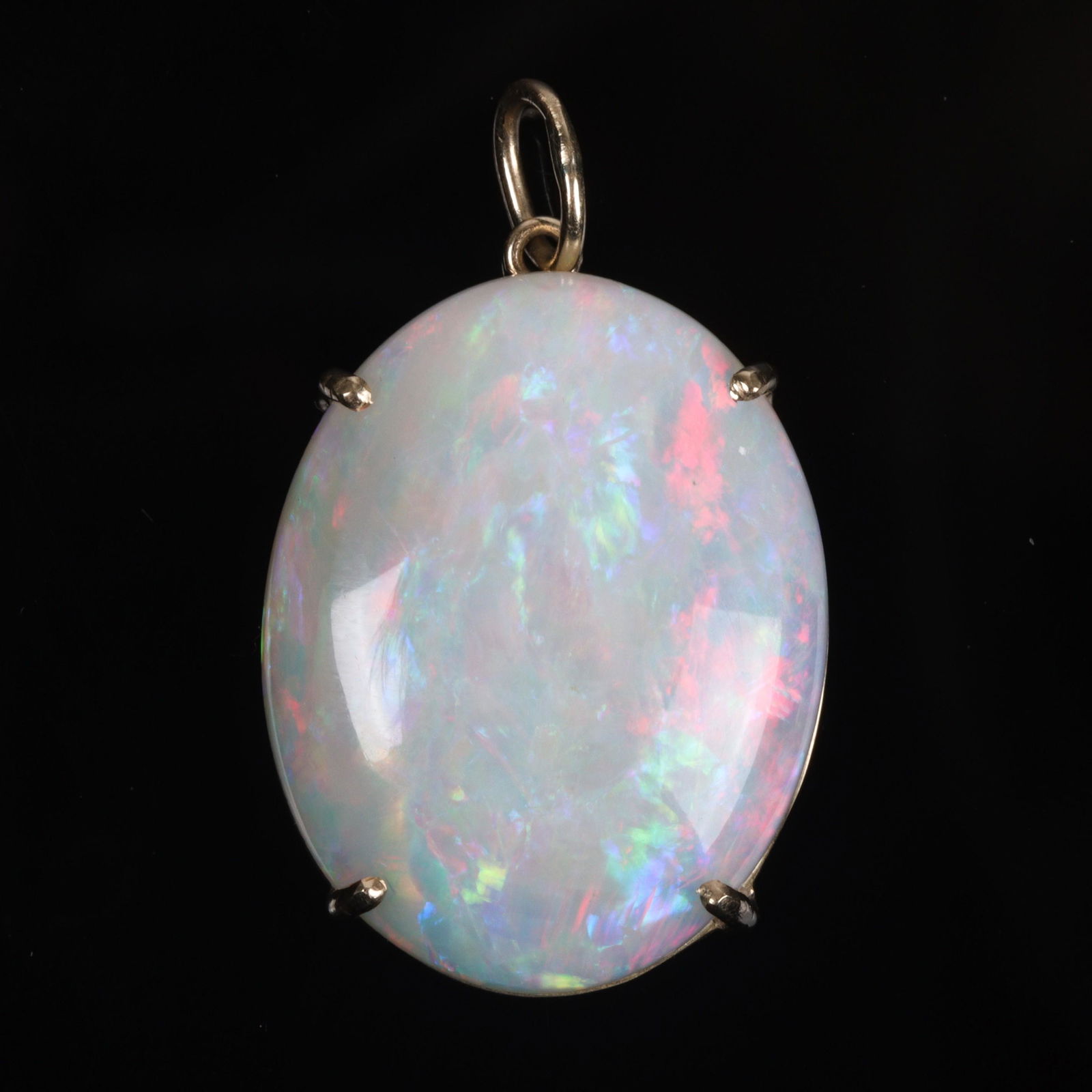 Oval Cabochon 7.25 ct. White Opal in 14K yellow gold pendant mounting. 1"H x 3/4"W (1 of 3)