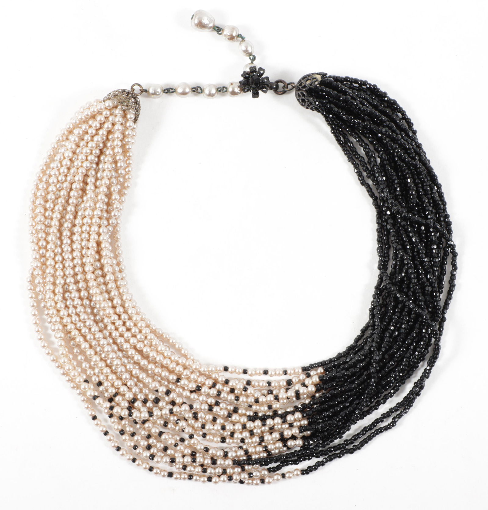 Miriam Haskell book piece; "Necklace of multiple twisted strands of smooth round pearls and black (1 of 6)
