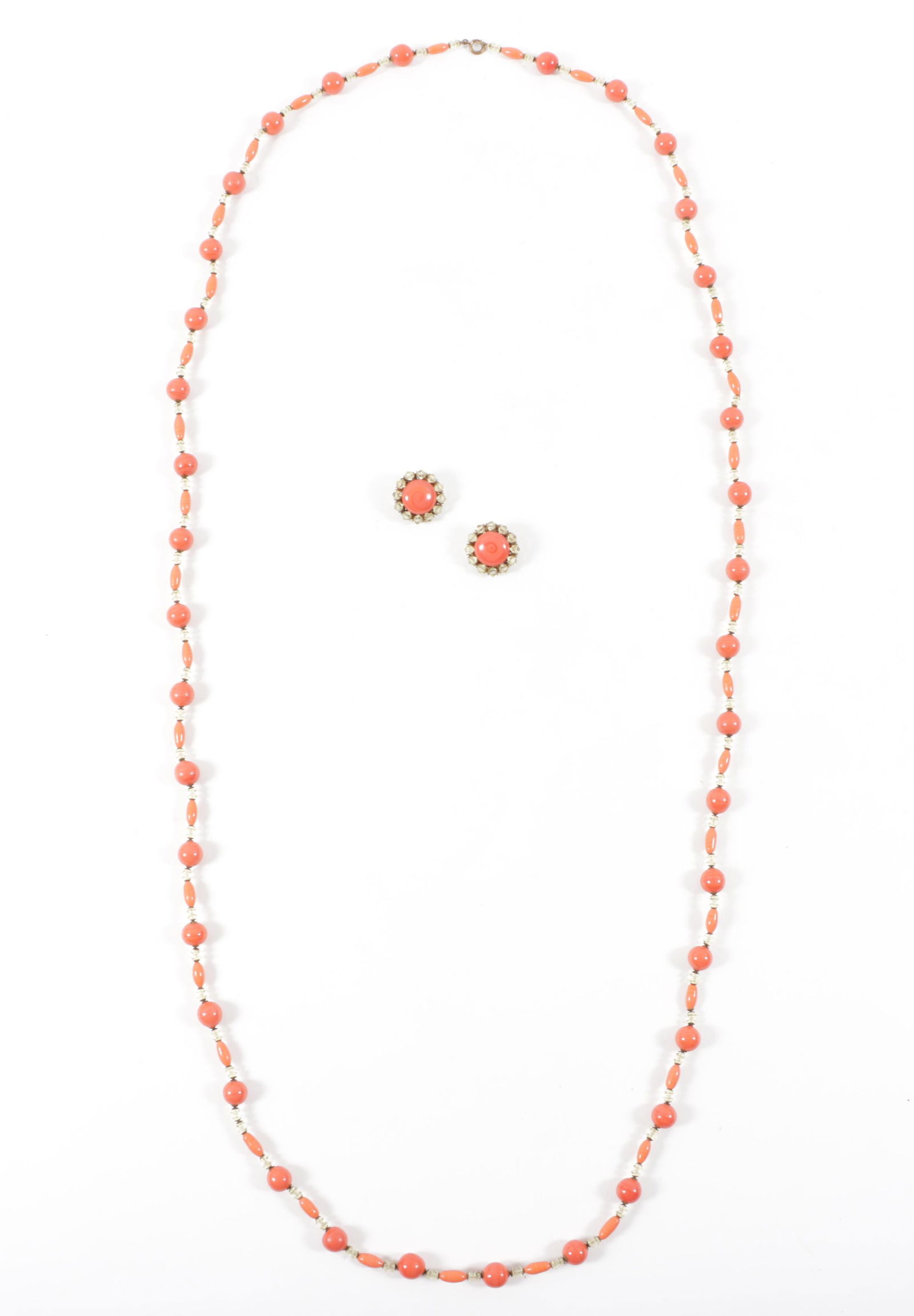 Miriam Haskell very long single strand necklace with coral colored glass beads and crystal spacers: Miriam Haskell very long single strand necklace with coral colored glass beads and crystal spacers and matching earrings 58"L x 1/2"W