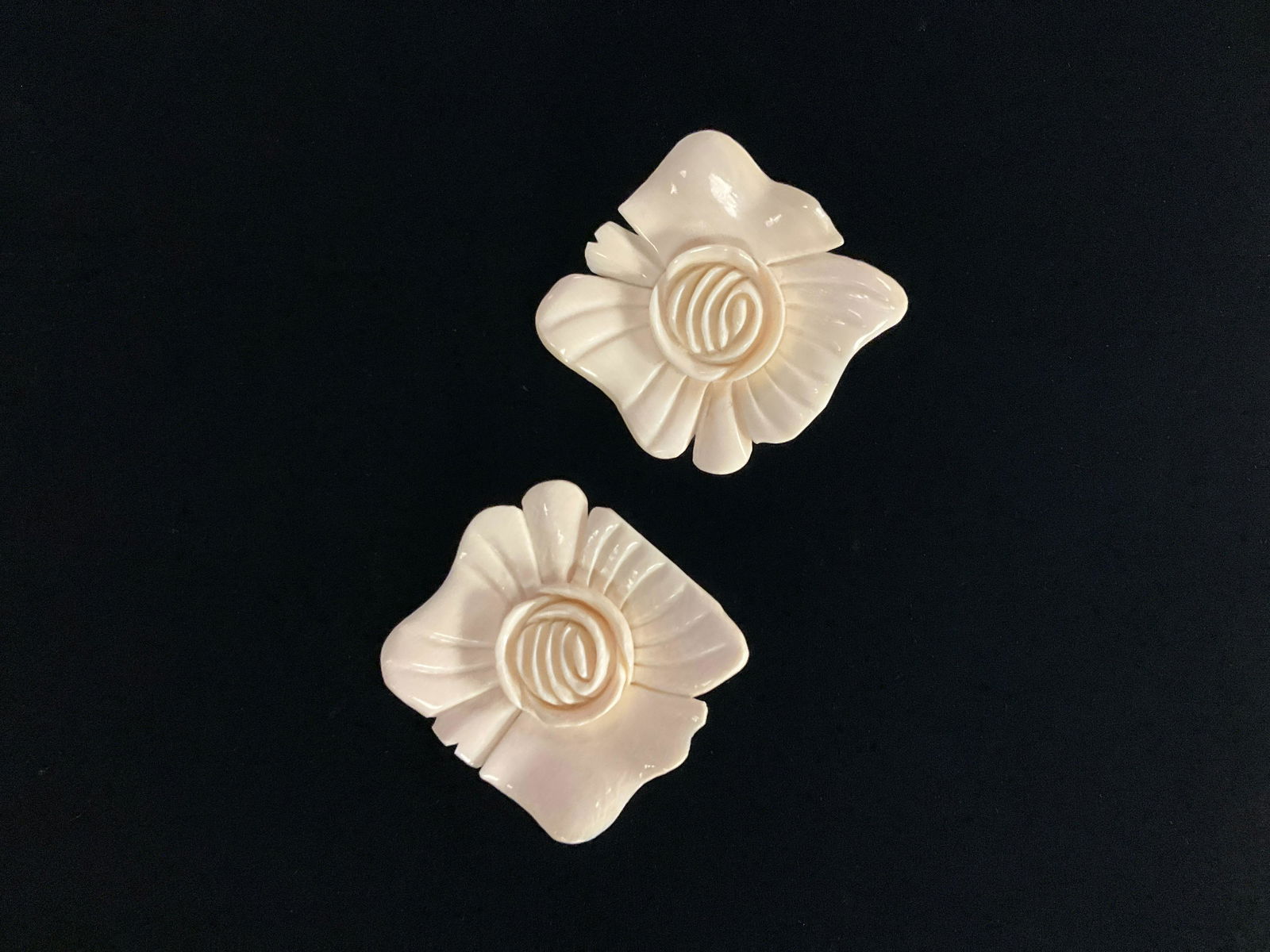Stephen Dweck bone and sterling silver carved rose earrings, with original tag 2 1/4"H x 2 1/4"W: Stephen Dweck bone and sterling silver carved rose earrings, with original tag 2 1/4"H x 2 1/4"W