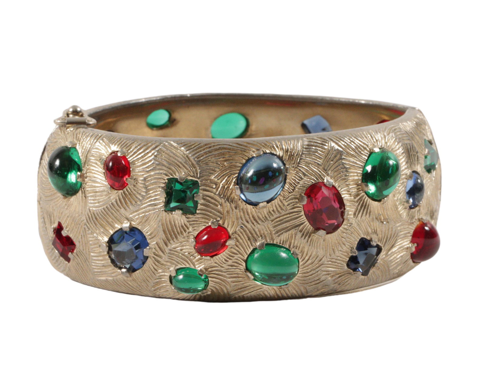 Castlecliff gold tone wide cuff bracelet with jewel tone green, red, and blue unfoiled glass: Castlecliff gold tone wide cuff bracelet with jewel tone green, red, and blue unfoiled glass cabochons and faceted crystals. 2"Diam. x 1 1/2"H
