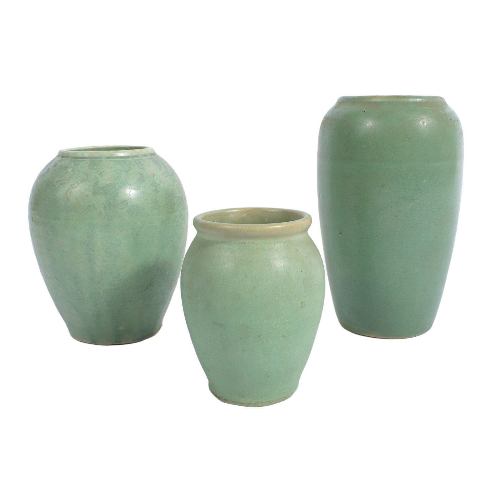 Lot of 3 Arts & Crafts celadon matte green American art pottery vases. 8"H x 4 1/2"Diam. (largest): Lot of 3 Arts & Crafts celadon matte green American art pottery vases. Largest vase has significant crazing. 8"H x 4 1/2"Diam. (largest)