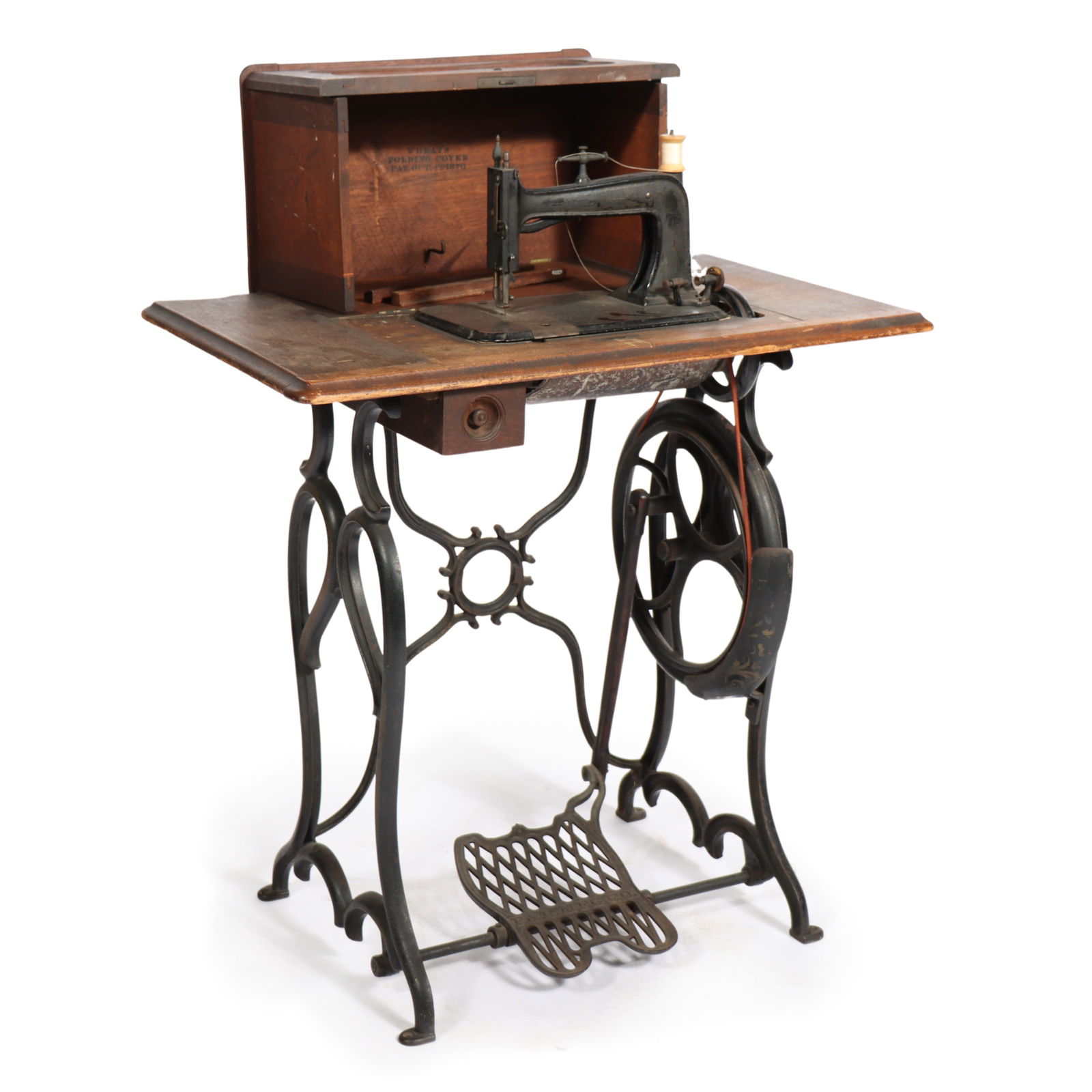 Antique Victorian treadle sewing machine on cast iron base. (1 of 12)