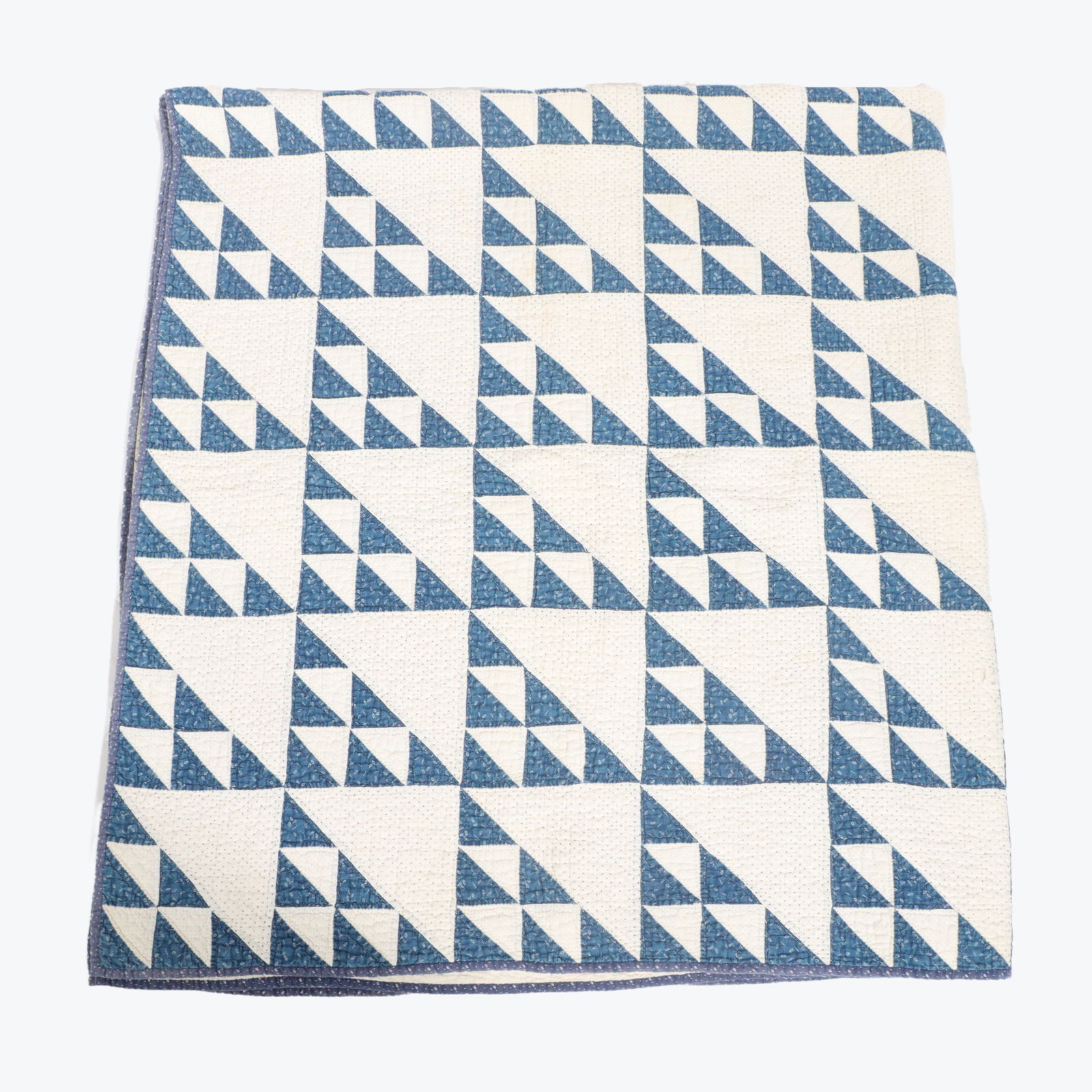 Vintage blue and white triangle block pattern cotton quilt. (1 of 4)
