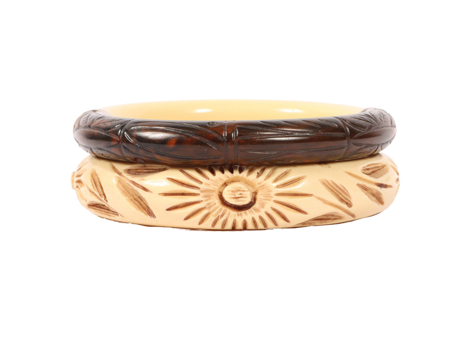 Vintage Givenchy carved two-tone cream and root beer Bakelite bangle bracelet with carved resin: Vintage Givenchy carved two-tone cream and root beer Bakelite bangle bracelet with carved resin floral bangle bracelet. 1/2"H x 2 1/2"Diam. (Givenchy)