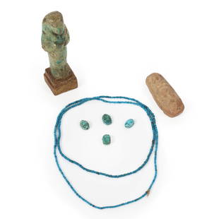 Lot of Egyptian objects: faience Ushabti, amulet, 4 carved faience turquoise scarab fetish,: Lot of Egyptian objects: faience Ushabti, amulet, 4 carved faience turquoise scarab fetish, turquoise dyed heishi necklace 4 3/4"H x 1 3/8"W x 1 3/8"D (Ushabti)