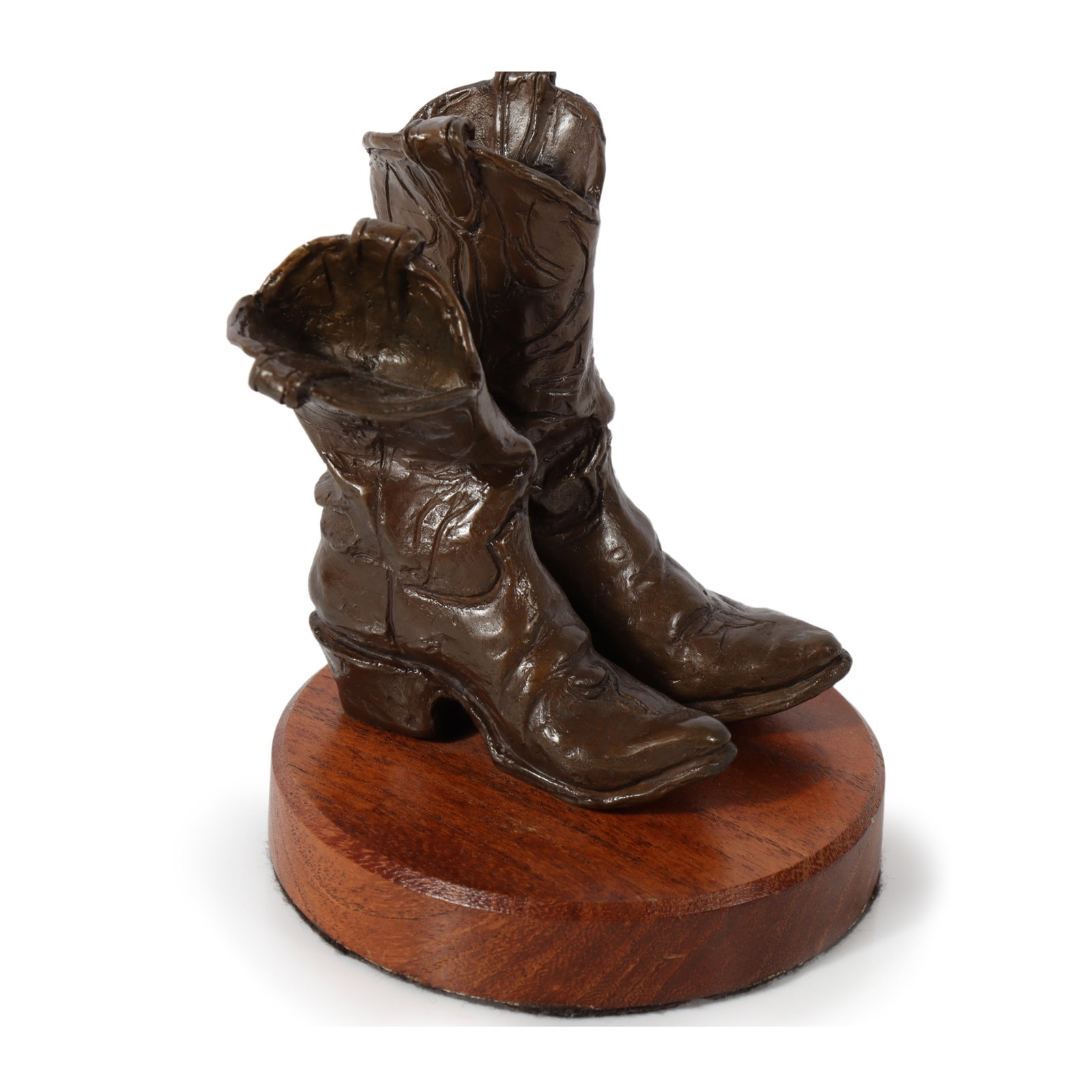 Dan Bates, Arizona (b.1951), Boots, bronze, 5 1/4" H x 4 1/4" W x 4" D: Dan Bates Arizona (b.1951) Boots bronze #74/100. Purchased from Troy's Western Heritage Gallery, Scottsdale, AZ, 12/23/1998. Purchase Price $275. Biography from the Archives of askART: The following b