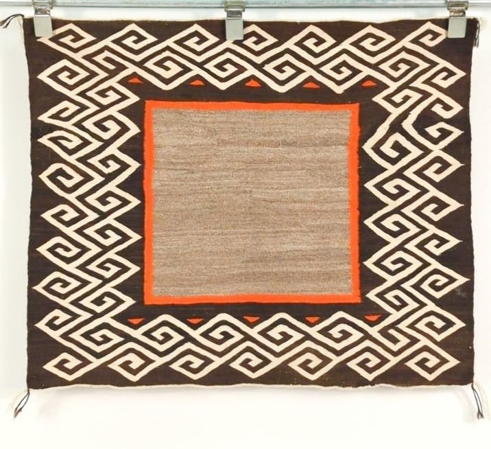Historic Germantown single saddle blanket, ca 1910-1920 27" x 32": Historic Germantown single saddle blanket, ca 1910-1920 Churro or Lincoln wool with orange aniline dye, classic Teec Nos Pos network border. Includes certificate of authenticity, Steve Getzwiller. Pro