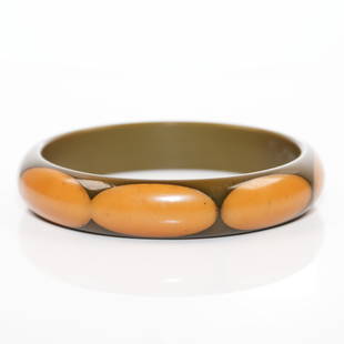 Vintage 1930's Belle Kogan Bakelite bangle bracelet in green with butterscotch elongated oval: Vintage 1930's Belle Kogan Bakelite bangle bracelet in green with butterscotch elongated oval laminated polka dots. 2 1/2"Inner Diam. x 1/2"W