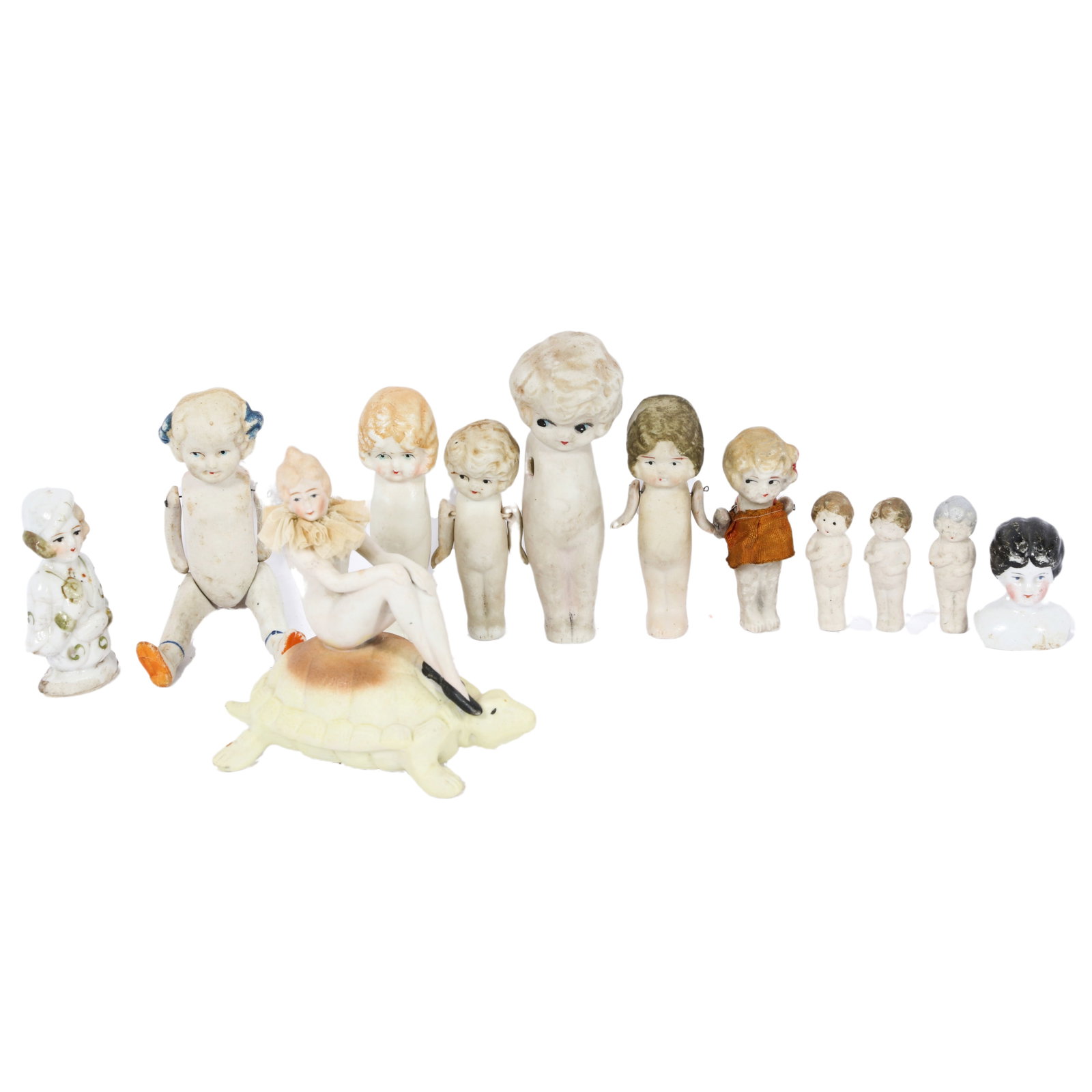 Collection of 12 miniature bisque and porcelain dolls: including a bathing beauty riding a turtle, 4 (1 of 12)