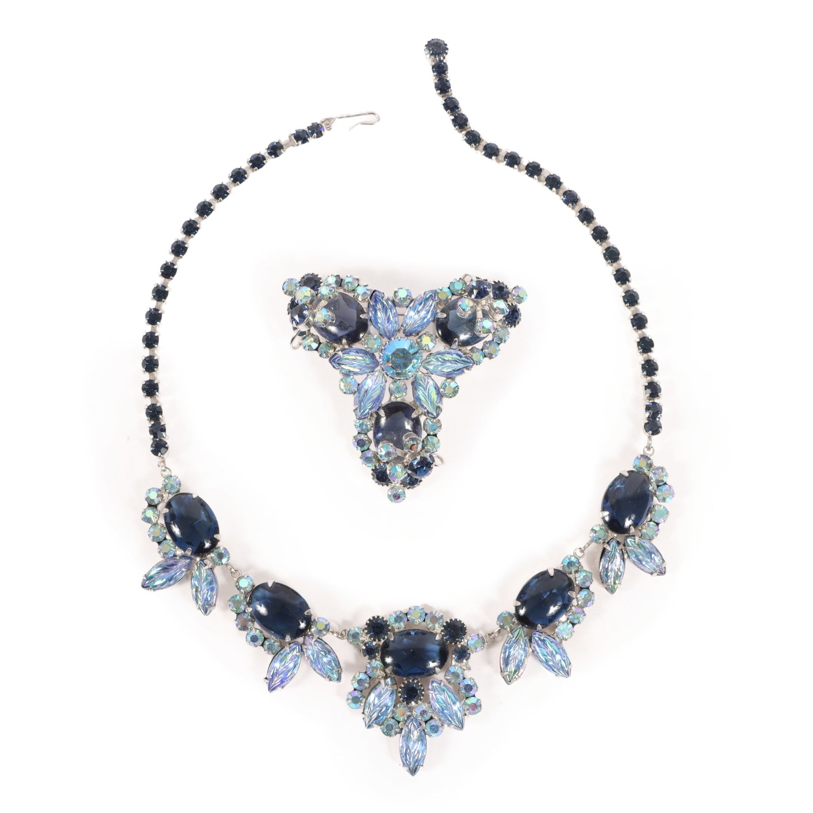 DeLizza & Elster Juliana necklace and brooch with AB molded glass jewels and dark sapphire blue: DeLizza & Elster Juliana necklace and brooch with AB molded glass jewels and dark sapphire blue glass cabochons and rhinestone jewels. Provenance: From the collection of Cheryl Killmer. 17 1/4"L x 2"W