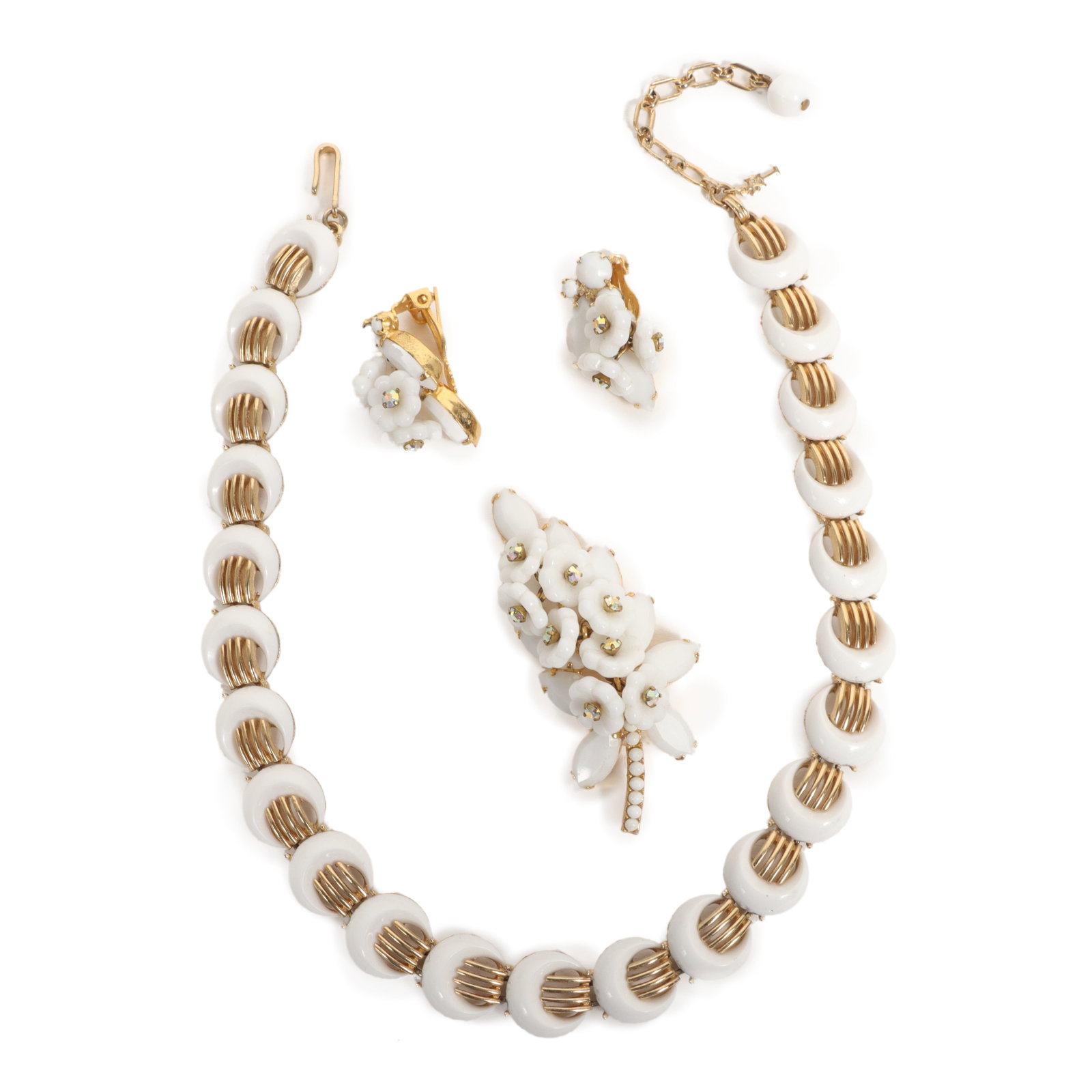 Vintage Trifari moons necklace with matching unsigned glass flower brooch and earrings.: Vintage Trifari moons necklace with matching unsigned glass flower brooch and earrings. Provenance: From the collection of Cheryl Killmer. 16 3/8"L x 5/8"W (necklace)