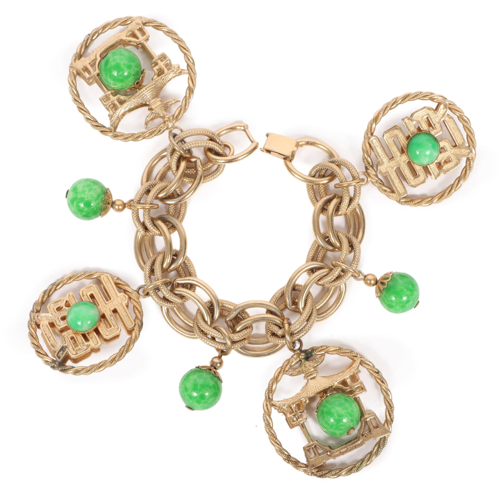 Napier Asian design charm bracelet with green Peking glass charms.: Napier Asian design charm bracelet with green Peking glass charms. Provenance: From the collection of Cheryl Killmer. 8"L x 2 1/2"Drop