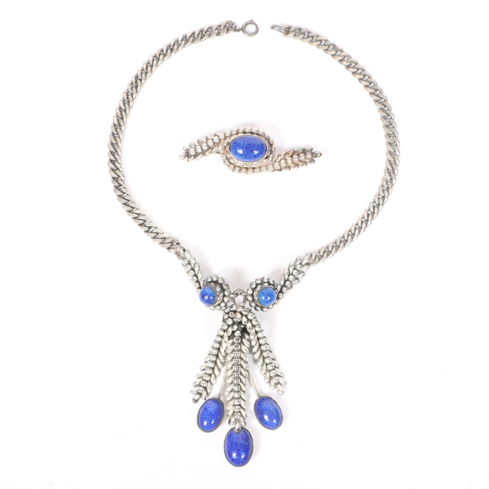 Napier matching set Including Faux Lapis pendant necklace and brooch.: Napier matching set Including Faux Lapis pendant necklace and brooch. Provenance: From the collection of Cheryl Killmer. 16"L x 3 1/2"Drop (necklace)