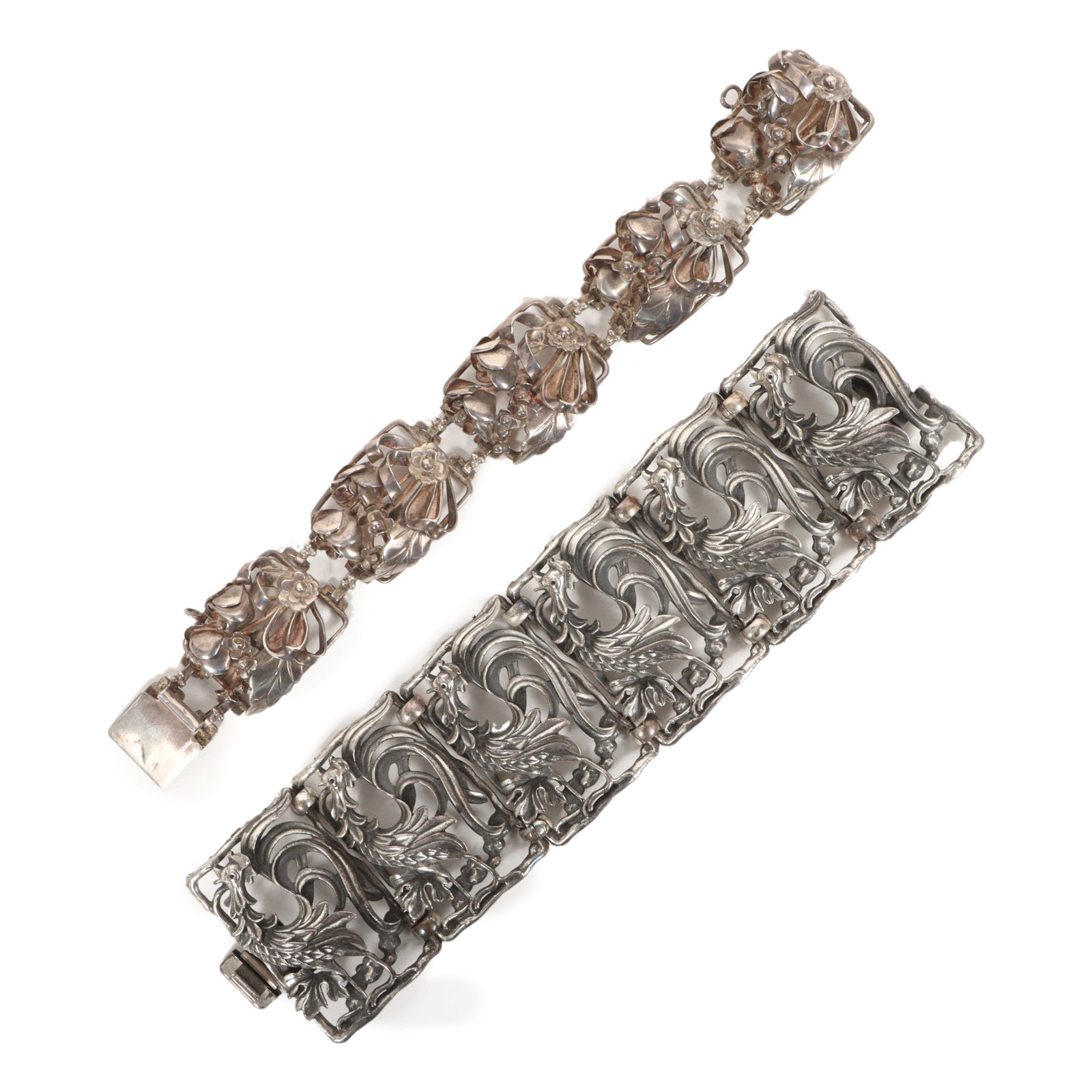 Napier rooster panel bracelet with sterling silver floral panel bracelet.: Napier rooster panel bracelet with sterling silver floral panel bracelet. Provenance: From the collection of Cheryl Killmer. 7"L x 1 3/4"W (rooster bracelet)