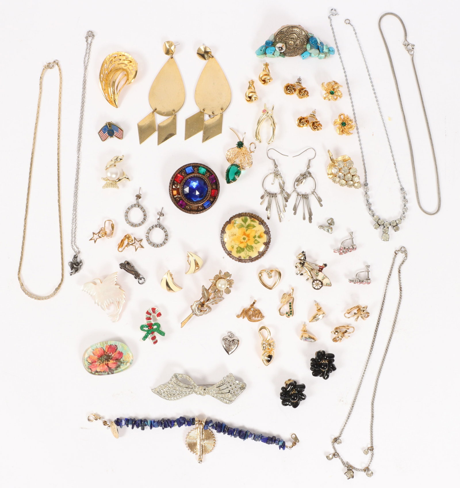 Vintage costume jewelry group including: Art Deco rhinestone bow brooch, Western Germany porcelain: Vintage costume jewelry group including: Art Deco rhinestone bow brooch, Western Germany porcelain brooch, Spanish Damascene flower brooch, and more. 1"H x 3 1/2"W (bow)
