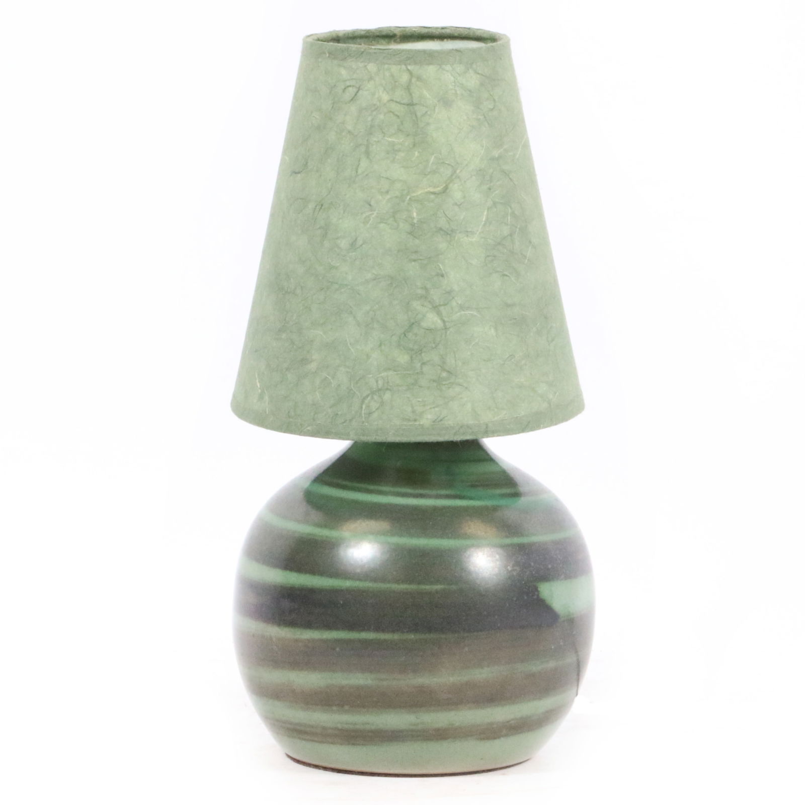 Gordon and Jane Martz Marshall Studios green stoneware pottery table lamp with original shade and: Gordon and Jane Martz Marshall Studios green stoneware pottery table lamp with original shade and painted band decoration. Incised signature to side of base "Martz." 14 3/4"H x 7 1/4"Diam.