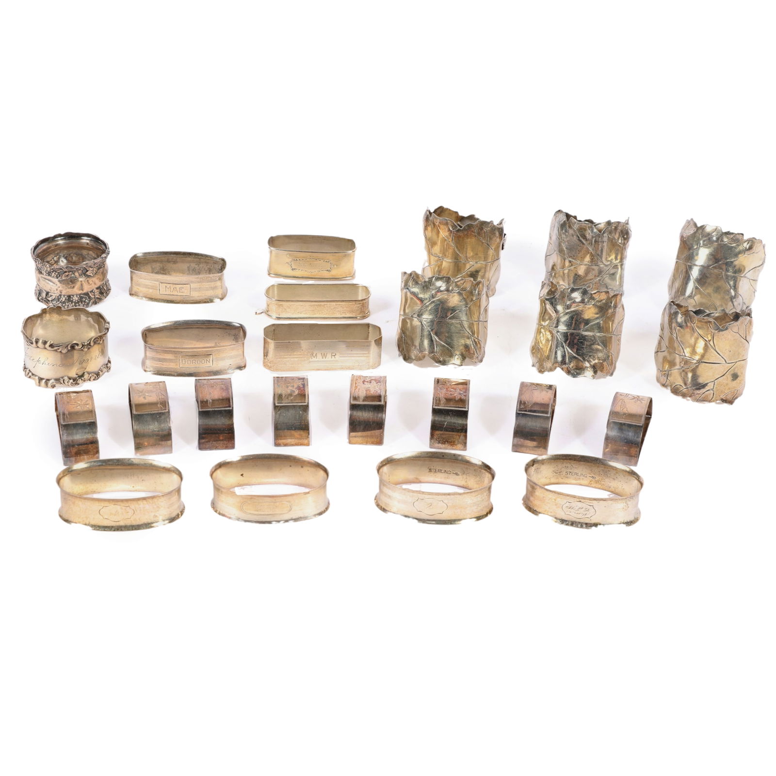 Collection of 25 sterling silver napkin holders: including a set of 8 demi-lune rings with engraved (1 of 20)