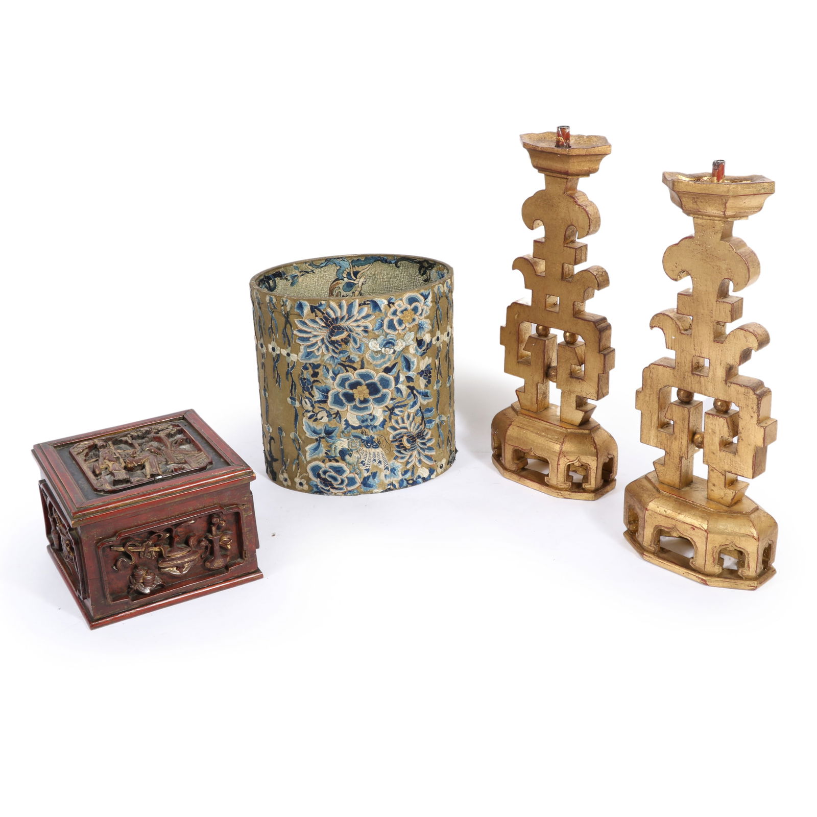 Lot of 3 decorative objects: Cauman fabric covered waste basket with cut out Chinese traditional: Lot of 3 decorative objects: Cauman fabric covered waste basket with cut out Chinese traditional blue and white silk floral needlework, 2 Asian giltwood auspiciouse candlesticks, Asian carved wooden b