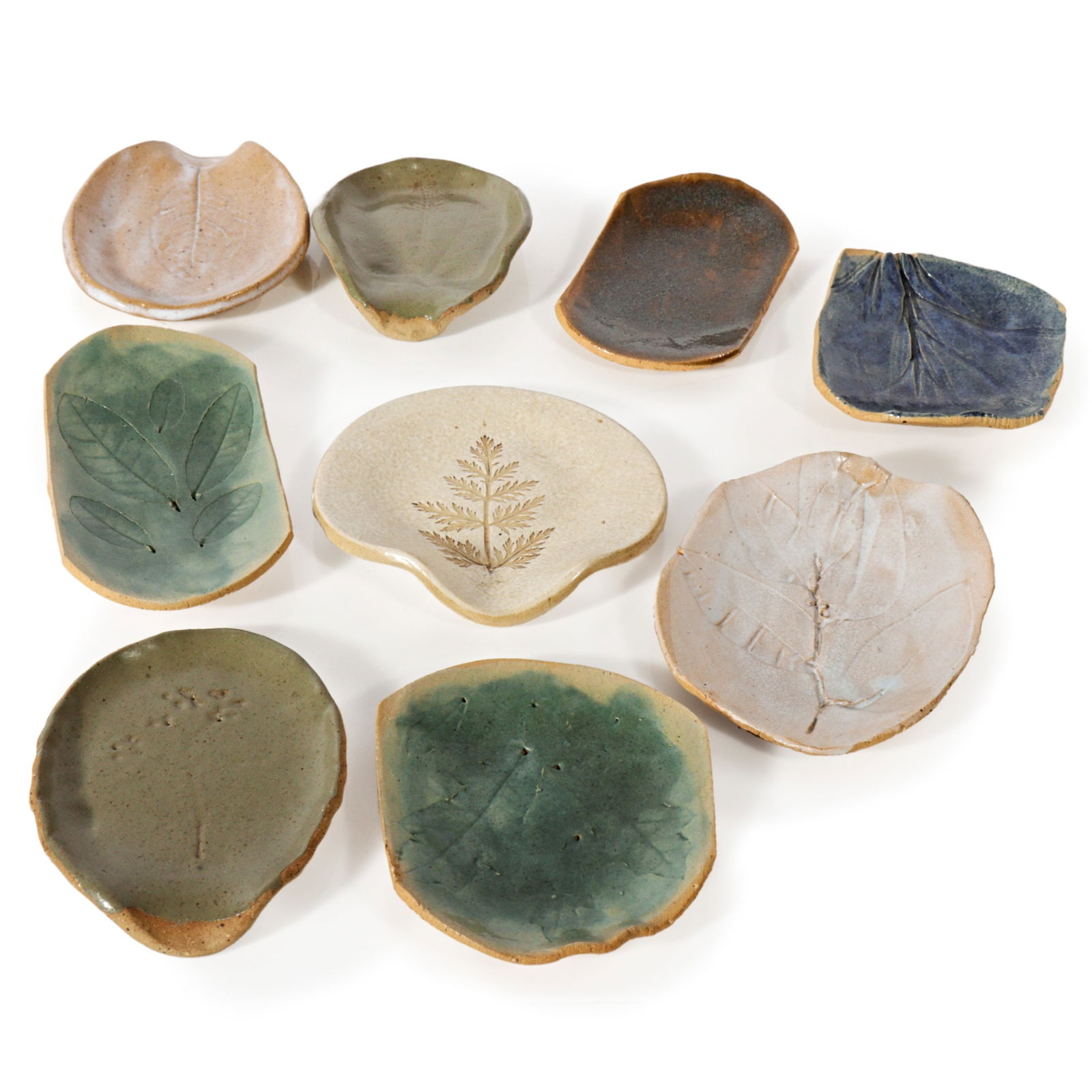 Collection of 9 studio pottery glazed stoneware spoon rests with botanical imprints 5 7/8"H x 3 (1 of 20)