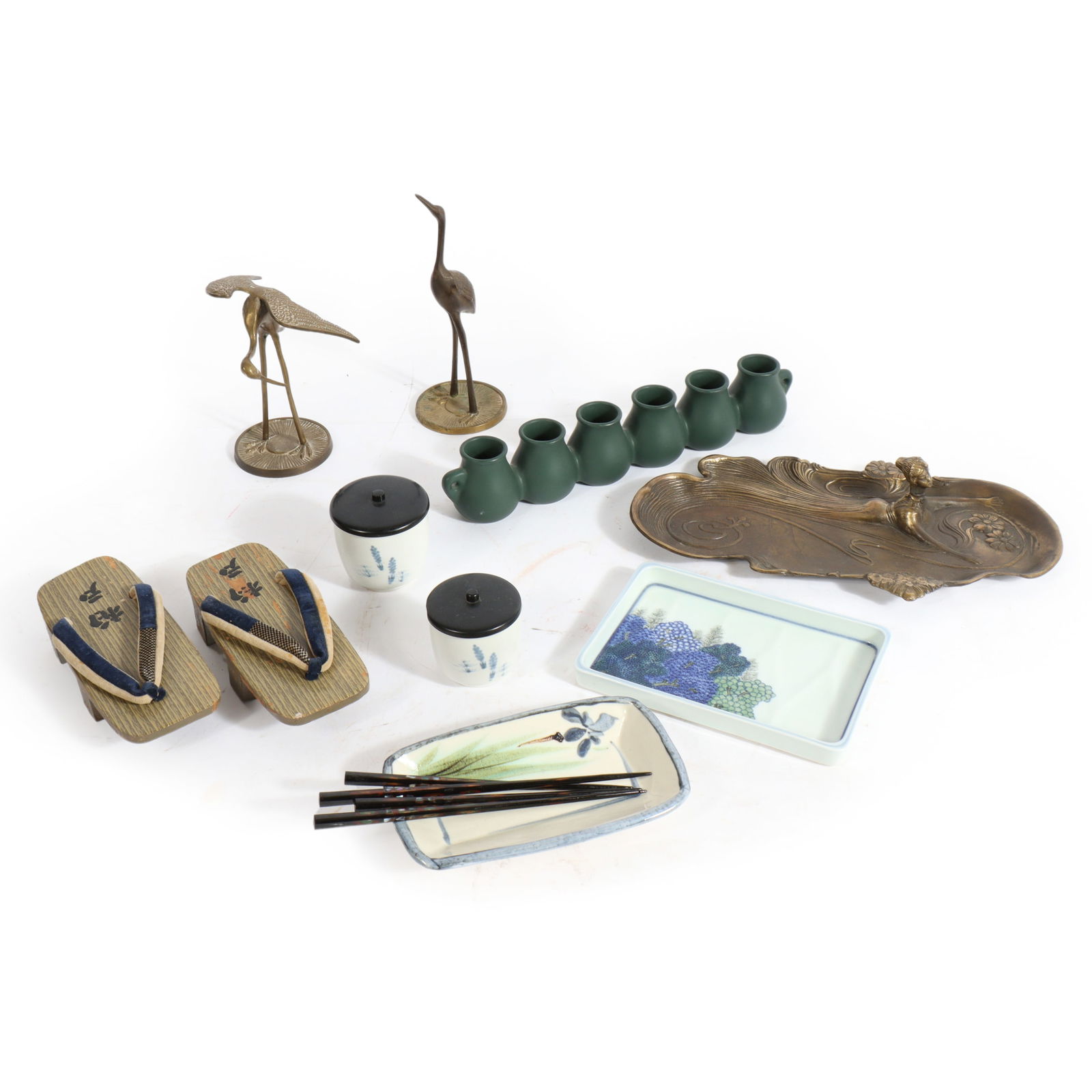 Lot of 14 Asian decorative objects: pair of brass cranes, Japanese geta sandals, 2 1/2"H x 14 1/4"W: Lot of 14 Asian decorative objects: pair of brass cranes, Japanese geta sandals, Art Nouveau brass figural tray, 2 floral ceramic trays, 2 Japanese tea cups with lids, 4 chopsticks, 6 linear conjoined