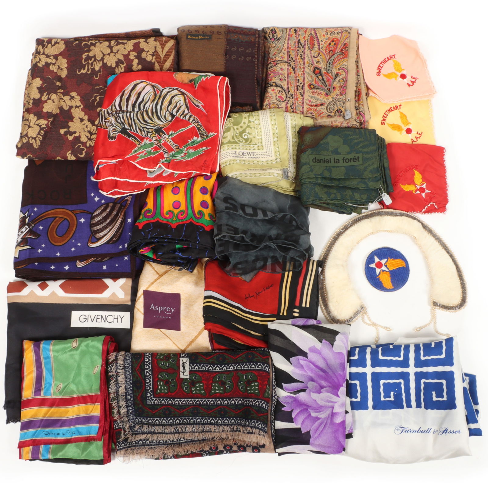 Vintage group of scarves and handkerchiefs including: Givenchy, Yves Saint Laurent, Oscar de la: Vintage group of scarves and handkerchiefs including: Givenchy, Yves Saint Laurent, Oscar de la Renta, Loewe, Anthony Xavier Edwards, Asprey London, San Diego zoo scarf, floral scarves, fur collar, an