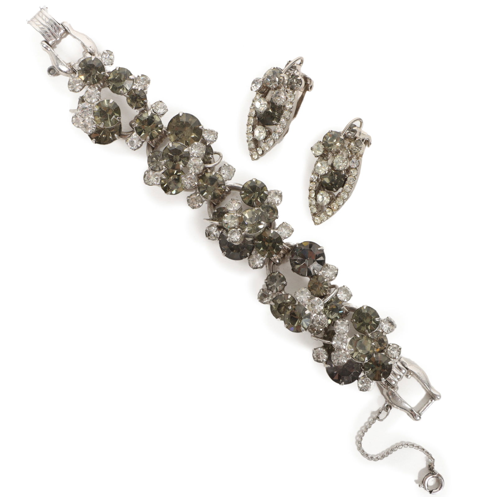 DeLizza & Elster Juliana; shades of grey dimensional rhinestones cluster bracelet with round jewels: DeLizza & Elster Juliana; shades of grey dimensional rhinestones cluster bracelet with round jewels and matching earrings. Provenance: From the collection of Cheryl Killmer. 7 1/8"L x 1 1/8"W (bracele