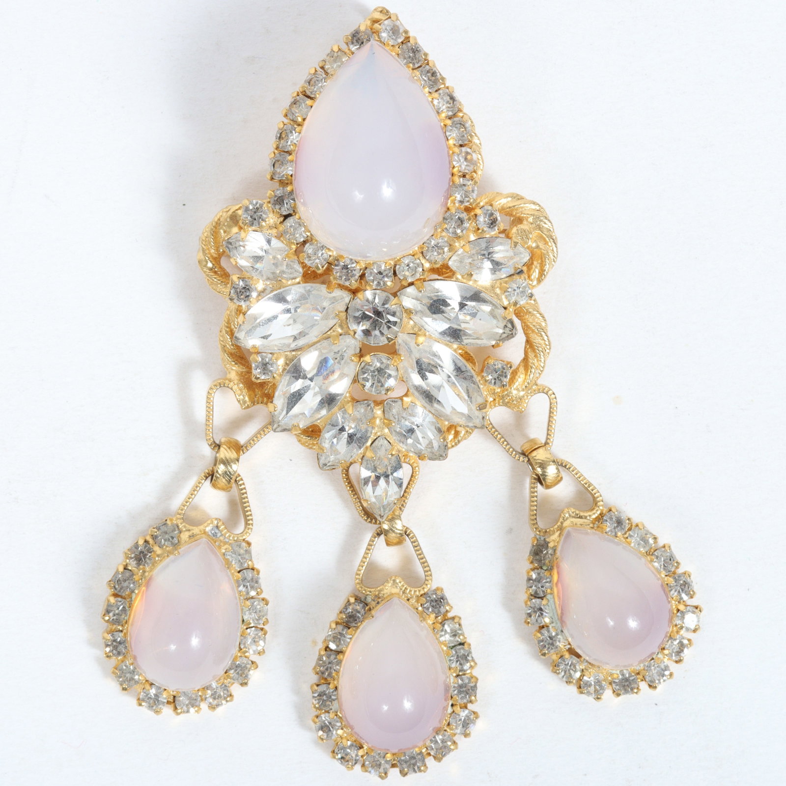 DeLizza & Elster Juliana pendant/brooch with large opalescent faux moonstone teardrop cabochon: DeLizza & Elster Juliana pendant/brooch with large opalescent faux moonstone teardrop cabochon dangles and gold tone rope accents with layered diamante marquis jewels and rhinestones. Provenance: From