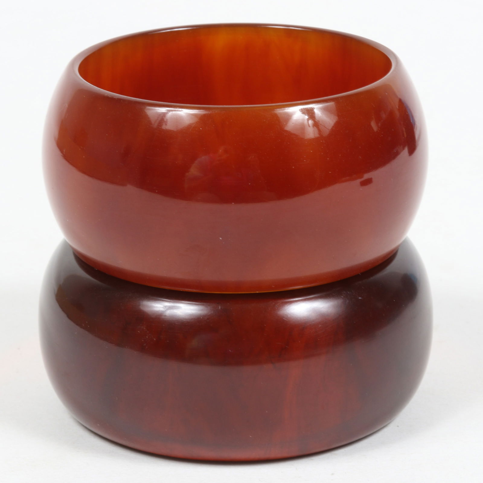 Pair of vintage root beer Bakelite wide chunky bangle bracelets. 1 1/2"H x 2 5/8"Inner Diameter (1 of 11)