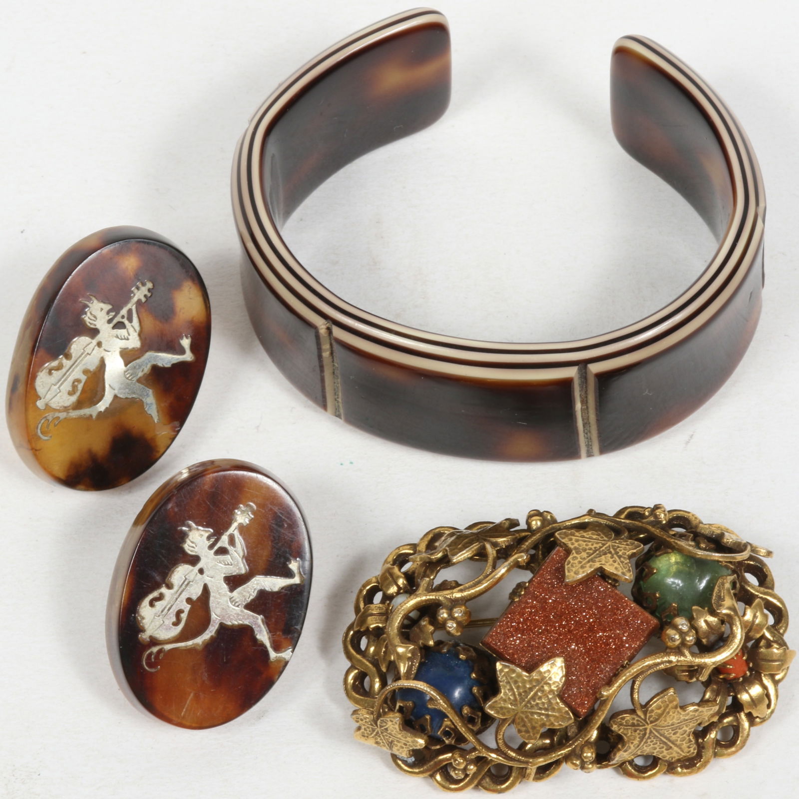 Faux Tortoiseshell layered cuff bracelet, faux tortoiseshell earrings with figural devil holding (1 of 6)