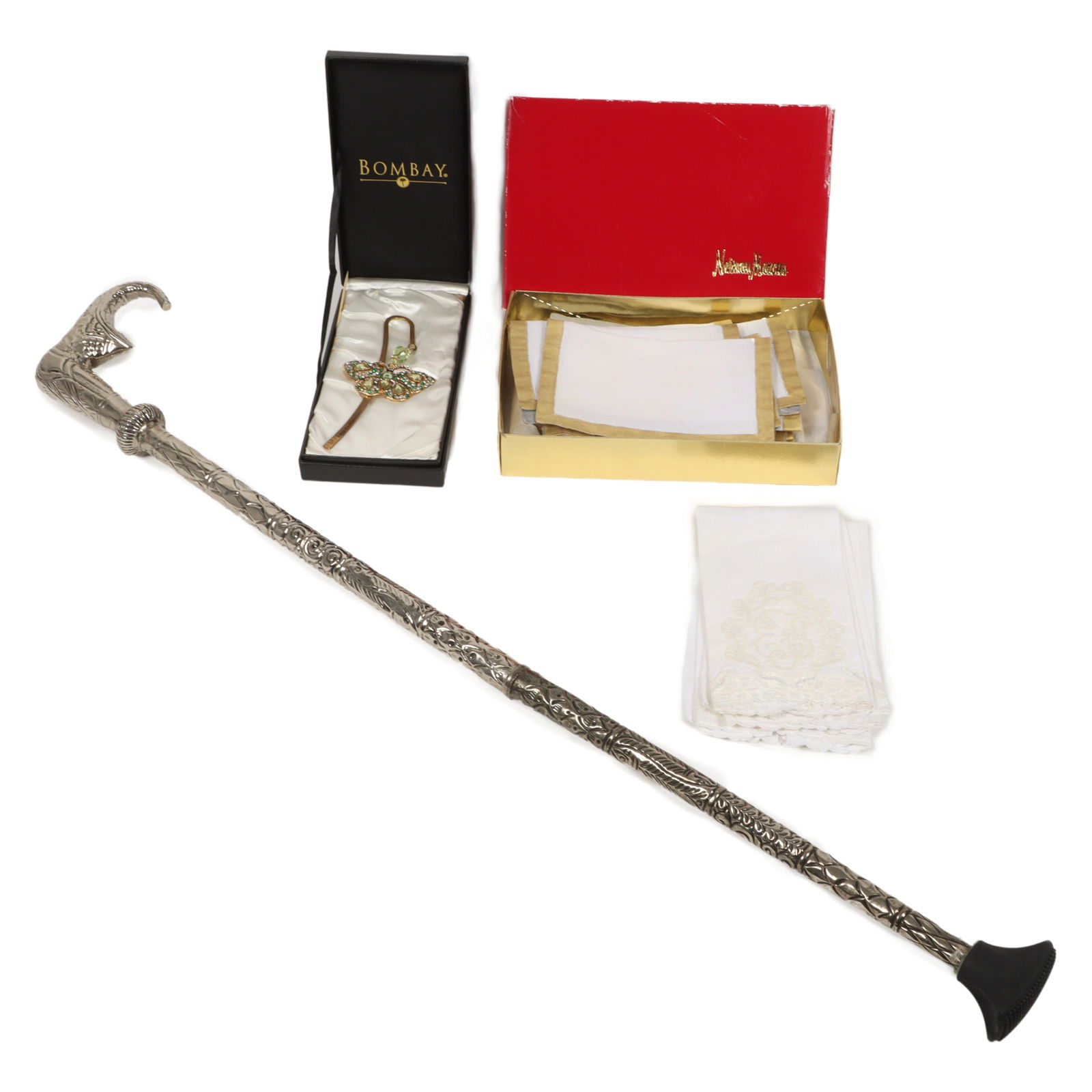 Ornate figural cane, rhinestone butterfly bookmark, and box of fabric napkins. 32"H x 5"WHandle: Ornate figural cane, rhinestone butterfly bookmark, and box of fabric napkins. 32"H x 5"WHandle (cane)