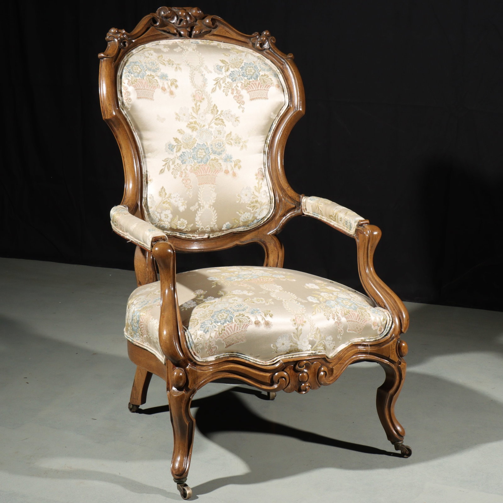 Victorian Rococo Revival carved upholstered shield back armchair parlor / library chair. 40 1/2"H x: Victorian Rococo Revival carved upholstered shield back armchair parlor / library chair. 40 1/2"H x 23 1/2"W x 24"D