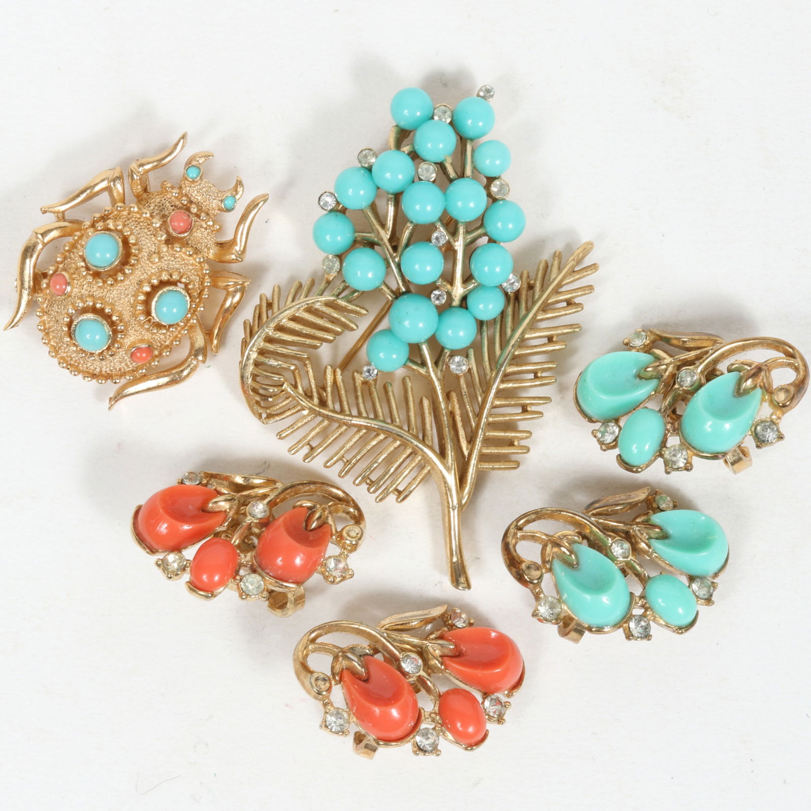Vintage Crown Trifari 4pc group including; faux coral and turquoise cabochon bug brooch, foliage (1 of 11)