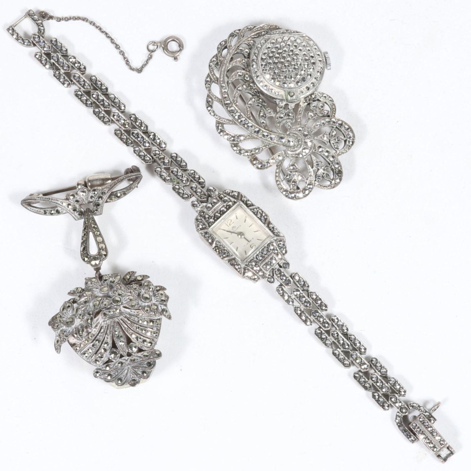 Art Deco 3pc. Bucherer Swiss made watch jewelry group: Marcasite 800 silver 17 jewels wrist watch,: Art Deco 3pc. Bucherer Swiss made watch jewelry group: Marcasite 800 silver 17 jewels wrist watch, 17 jewels marcasite feather locket clock pin brooch, and marcasite lapel pin 17 jewels clock watch pi