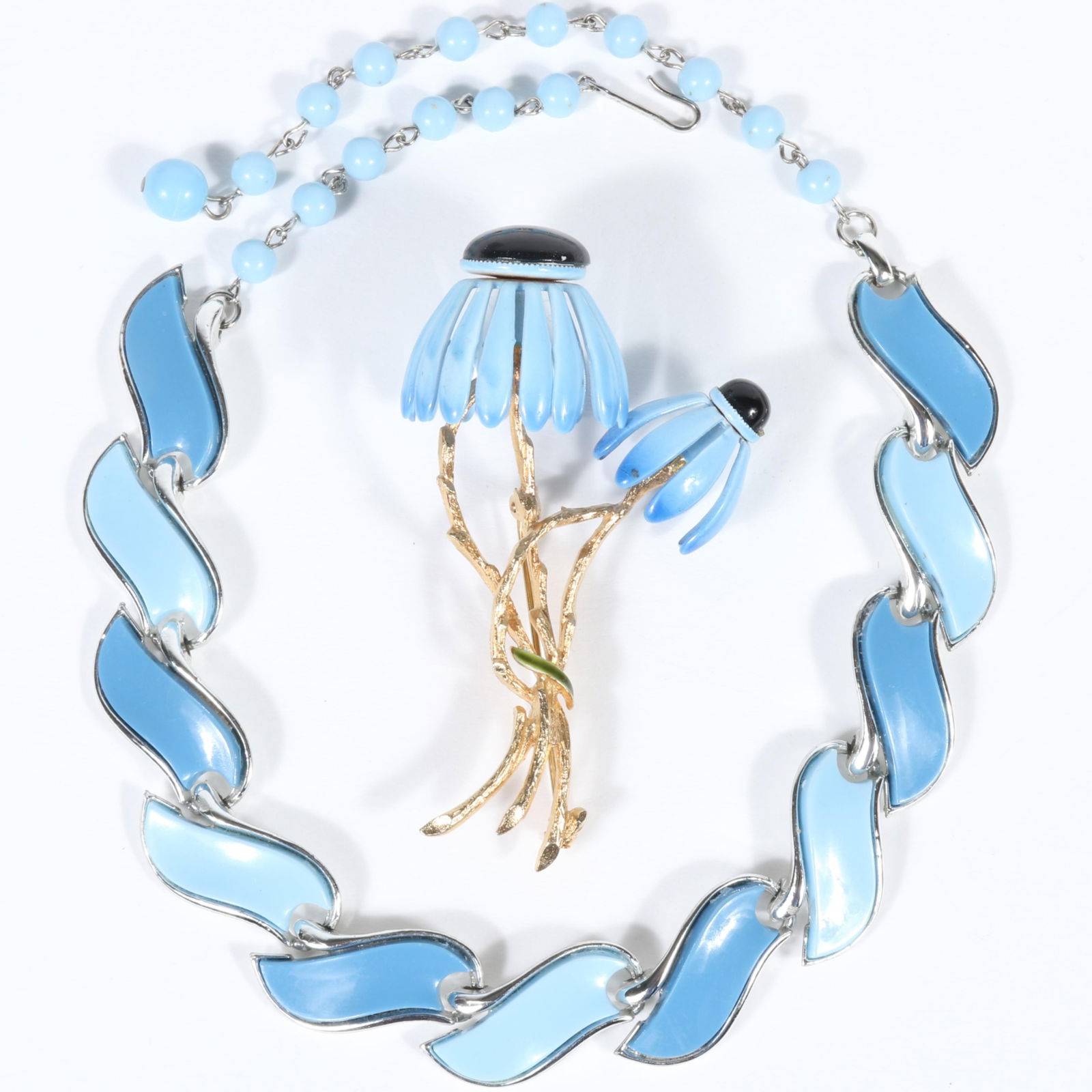Vintage Coro thermoset plastic pastel blue necklace and Coro craft / Corocraft blue enamel double: Vintage Coro thermoset plastic pastel blue necklace and Coro craft / Corocraft blue enamel double daisy flower brooch. Provenance: From the collection of Cheryl Killmer. Some wear to enamel flower. 16