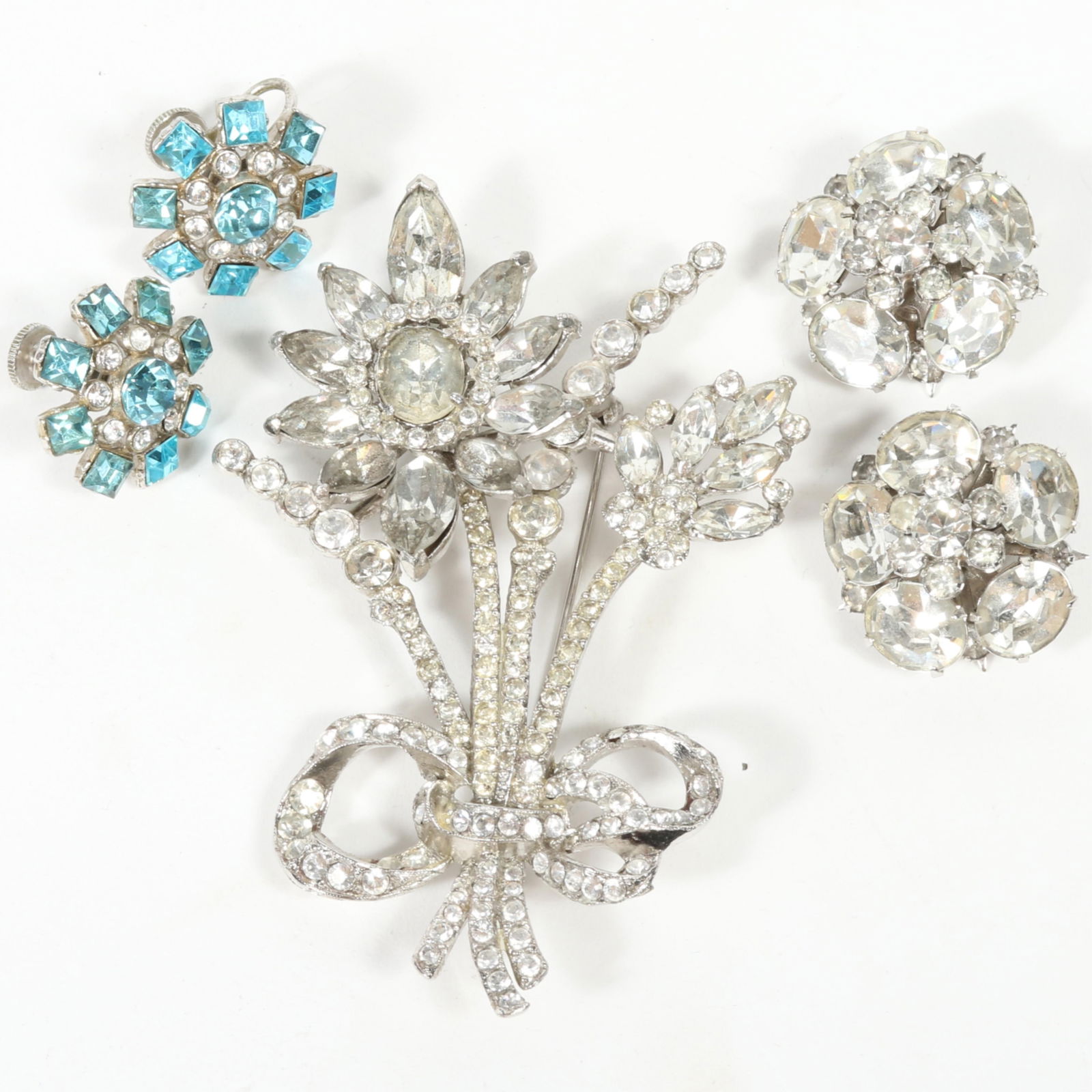 Vintage Coro 3pc rhinestone crystal group of flower bouquet brooch, and two pairs of jeweled floral: Vintage Coro 3pc rhinestone crystal group of flower bouquet brooch, and two pairs of jeweled floral earrings. From the private collection of Leigh Leshner, author of 9 Costume Jewelry research books f
